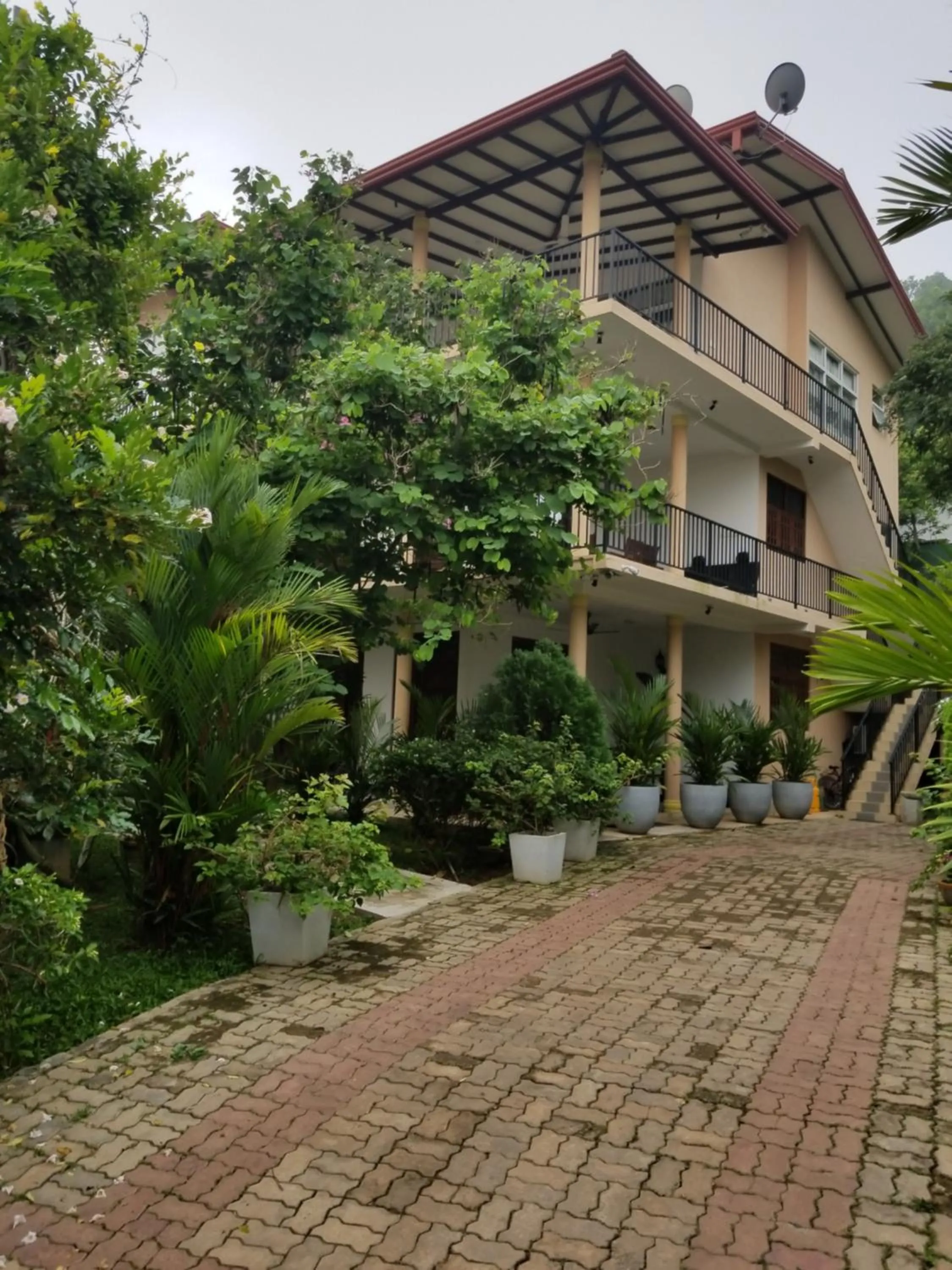 Property building in Coral Palm Villa and Apartment
