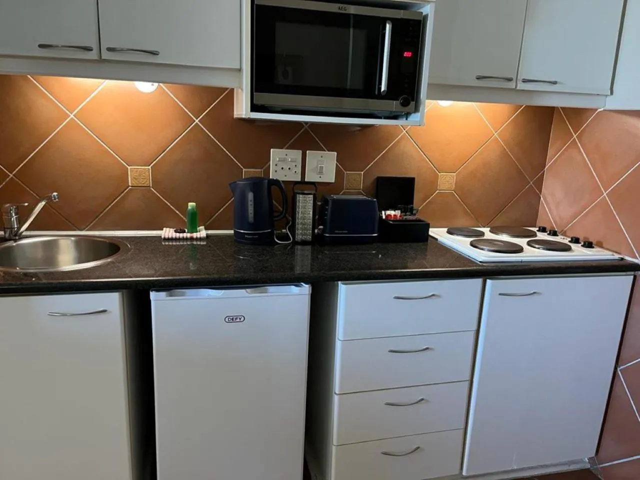 Kitchen or kitchenette in Cape Town Beachfront Apartments at Leisure Bay