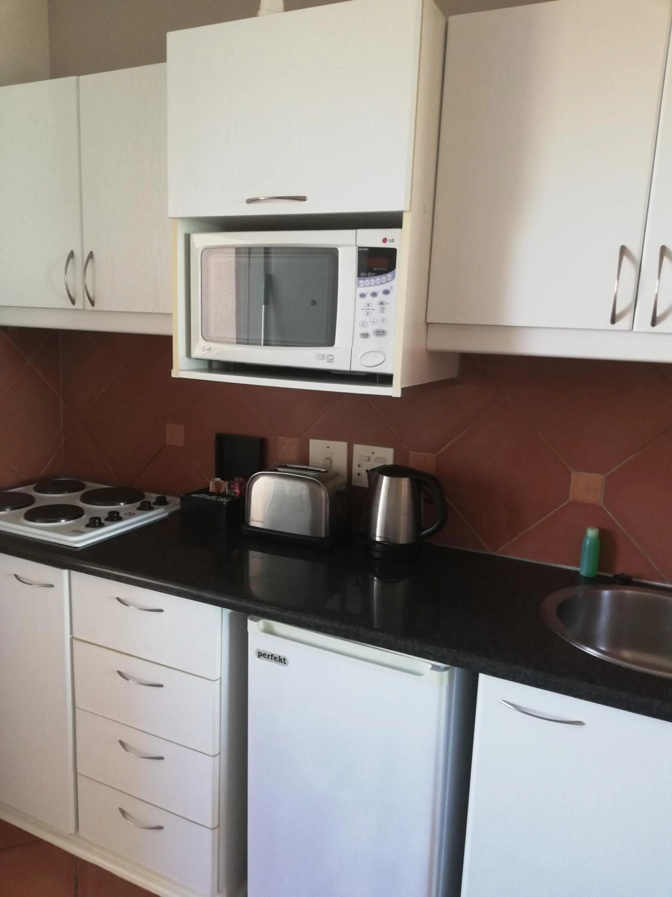 Kitchen or kitchenette in Cape Town Beachfront Apartments at Leisure Bay