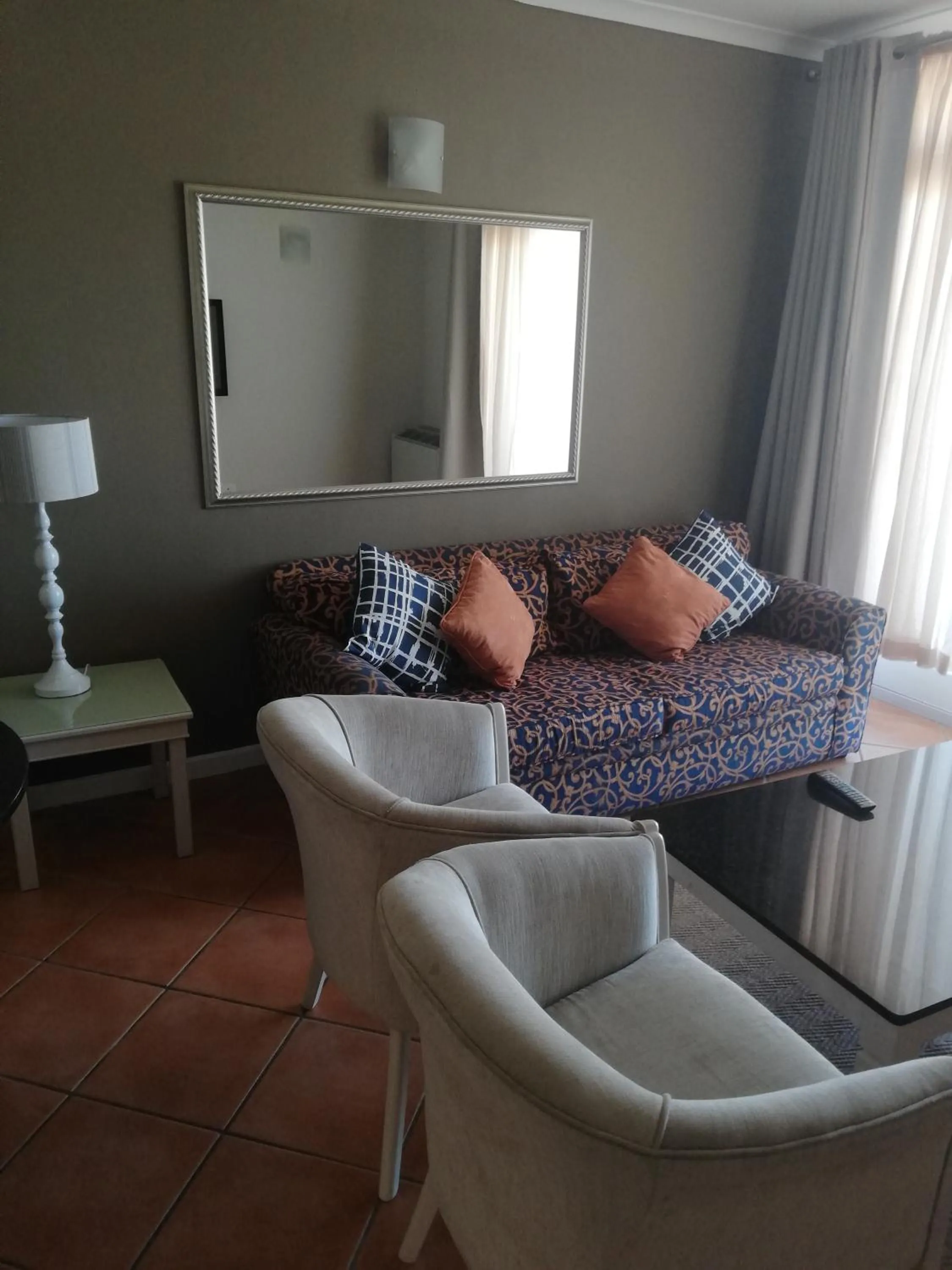 Communal lounge/ TV room in Cape Town Beachfront Apartments at Leisure Bay