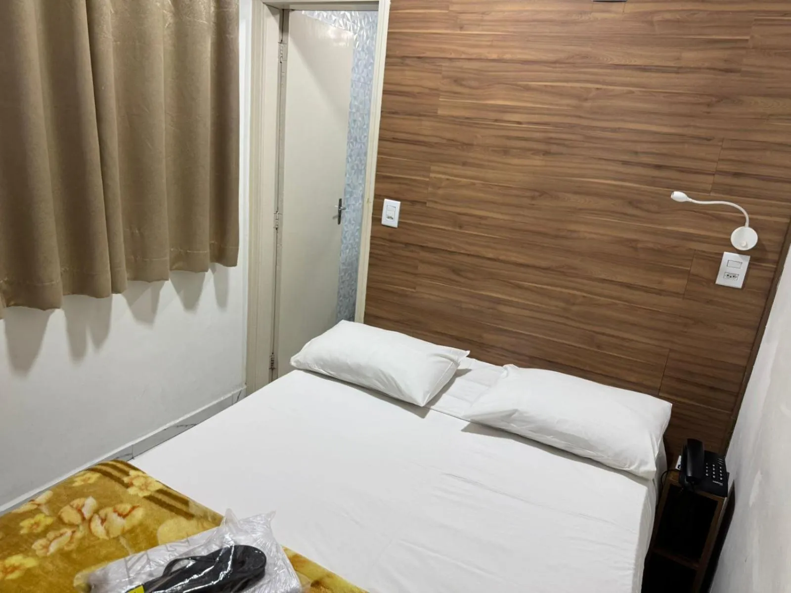 Bed in New Point Hotel