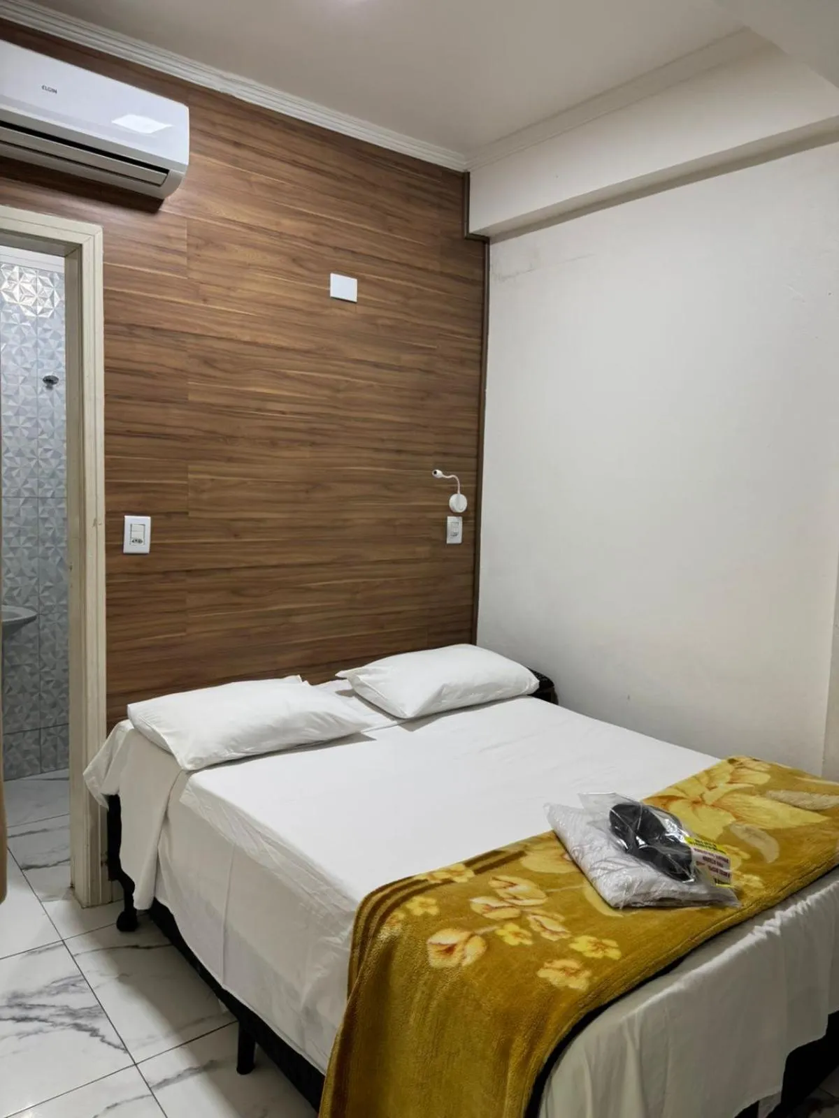 Bed in New Point Hotel