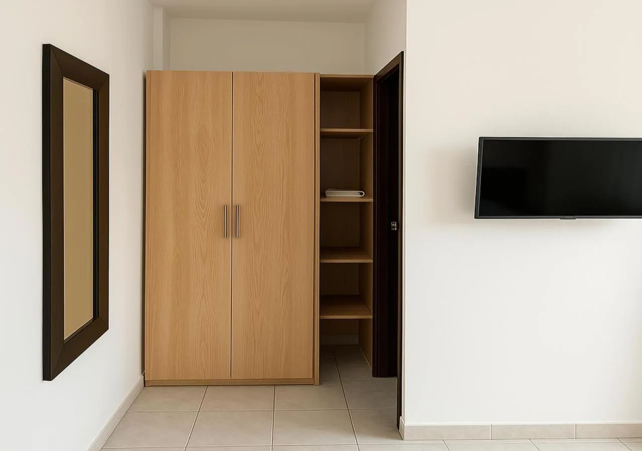 wardrobe in Don David Sabana Hotel