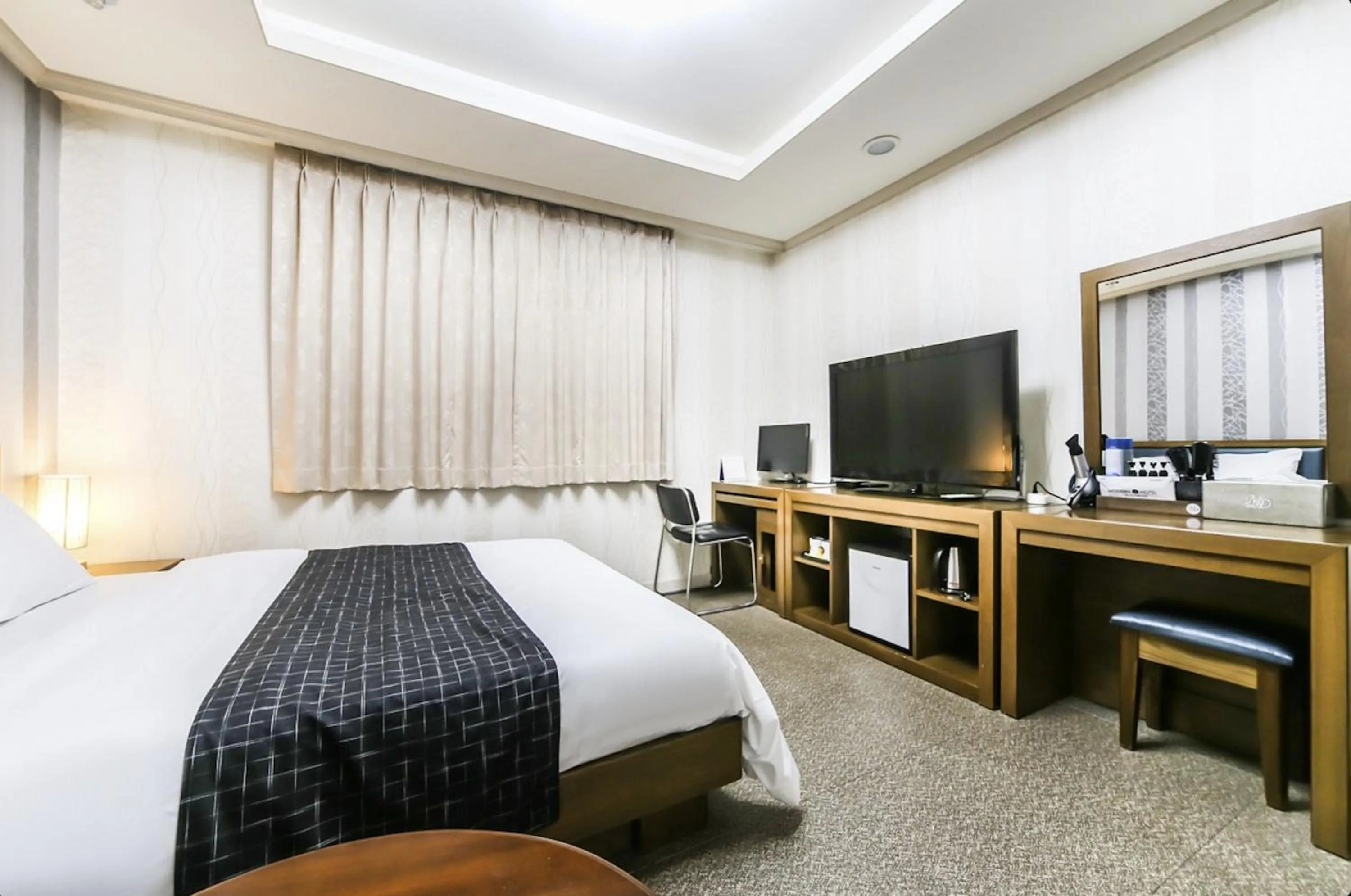 Bed in Modern Business Hotel