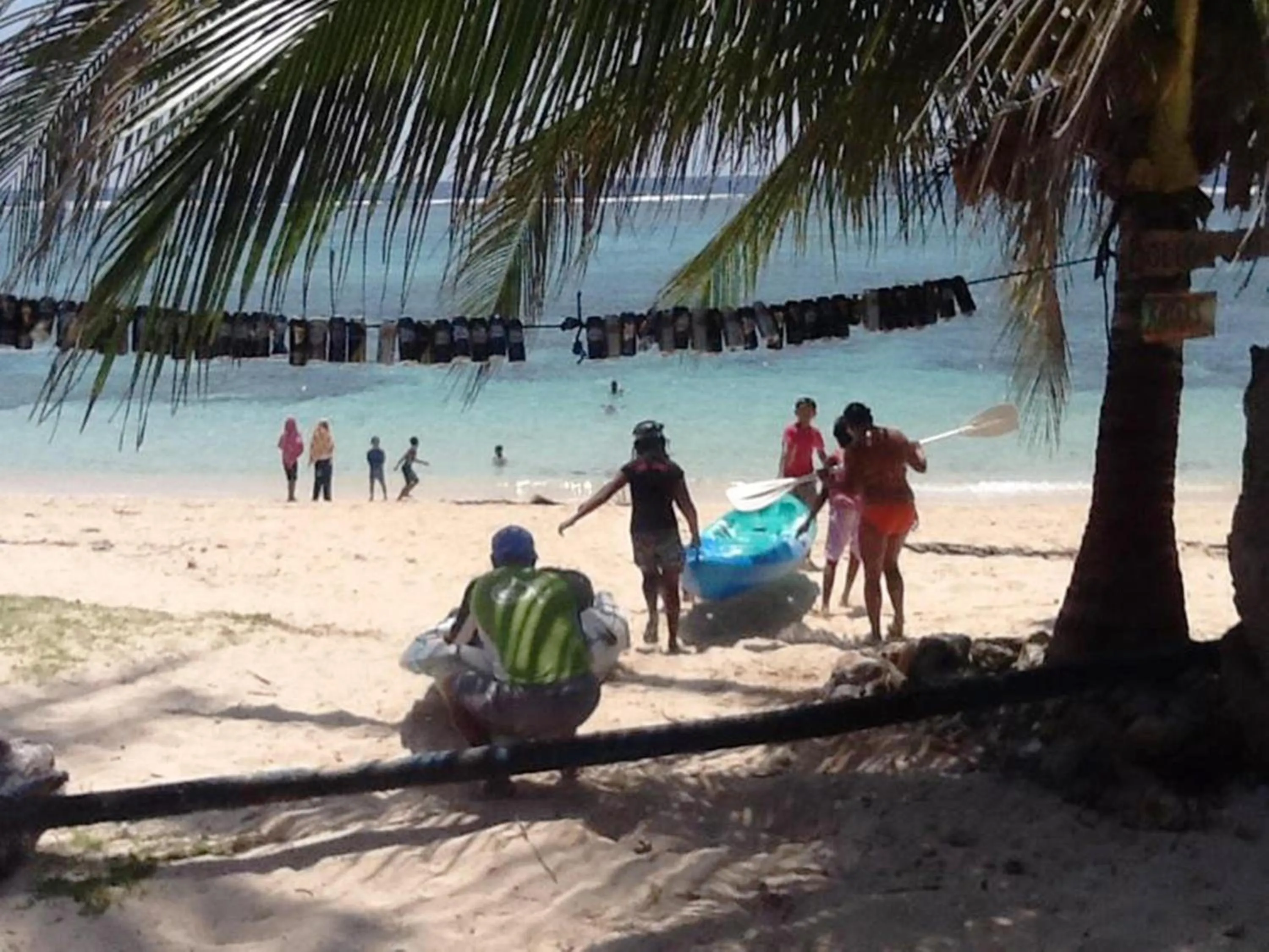 People in Whitesands Beach Resort