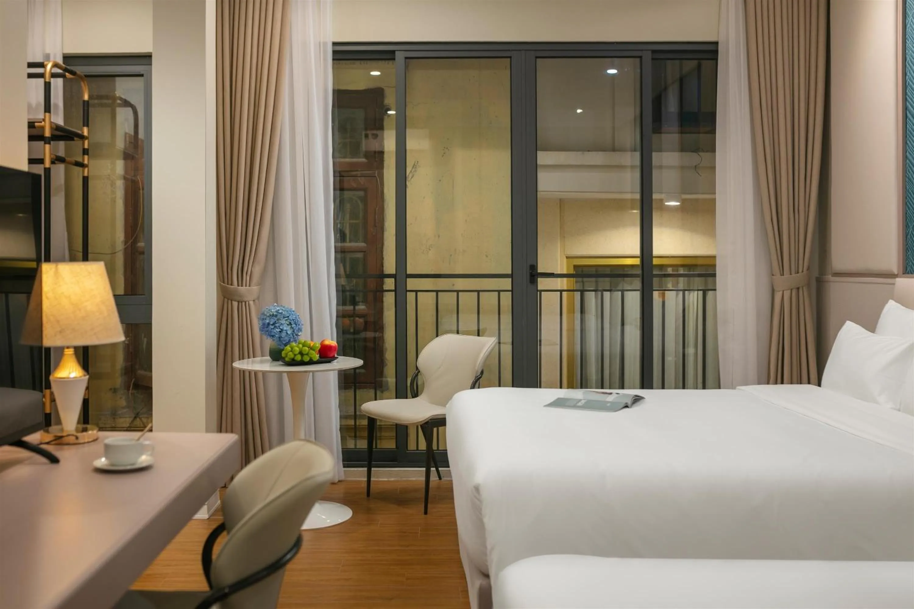 Bed in Dong Xuan Boutique Hotel