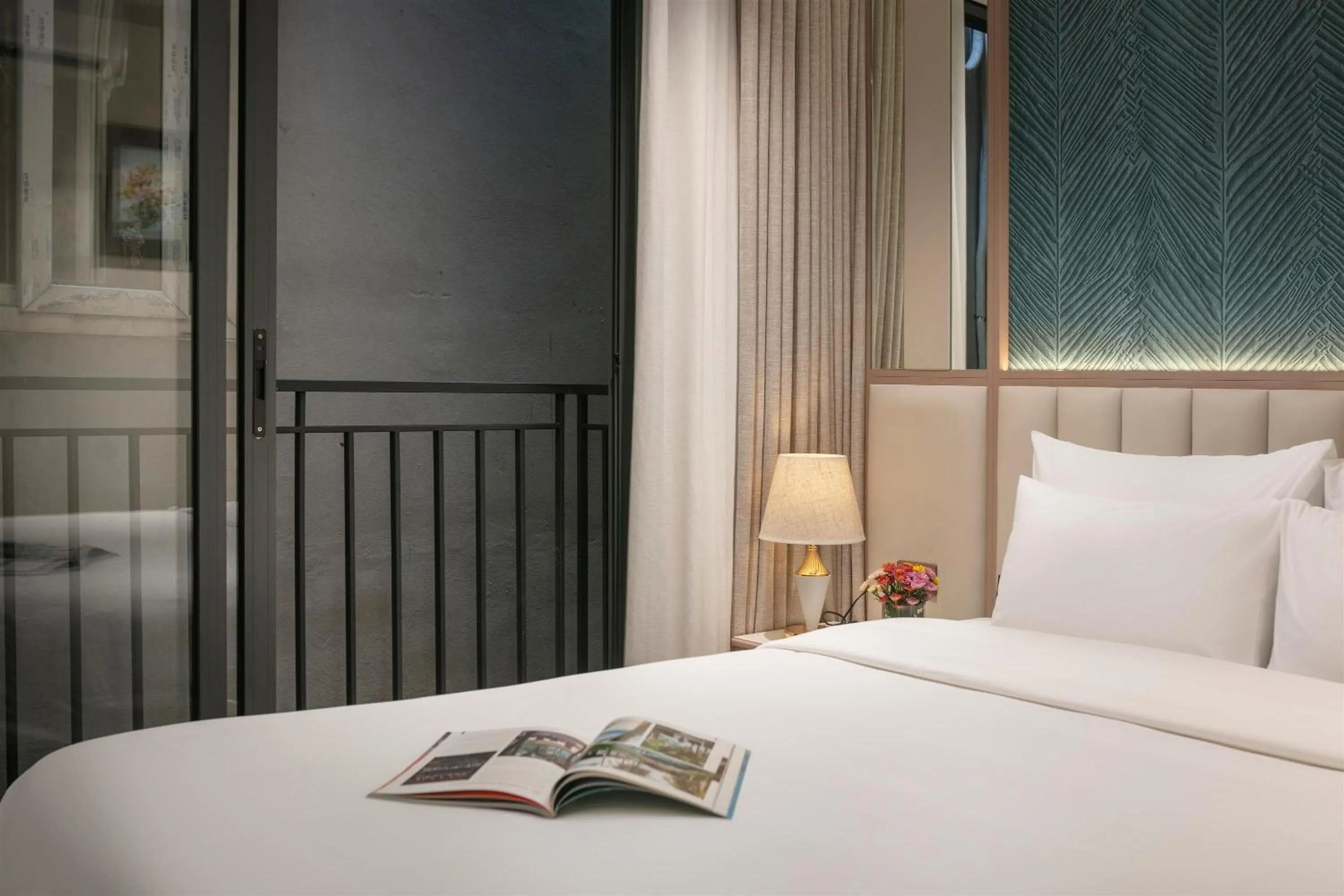 Bed in Dong Xuan Boutique Hotel