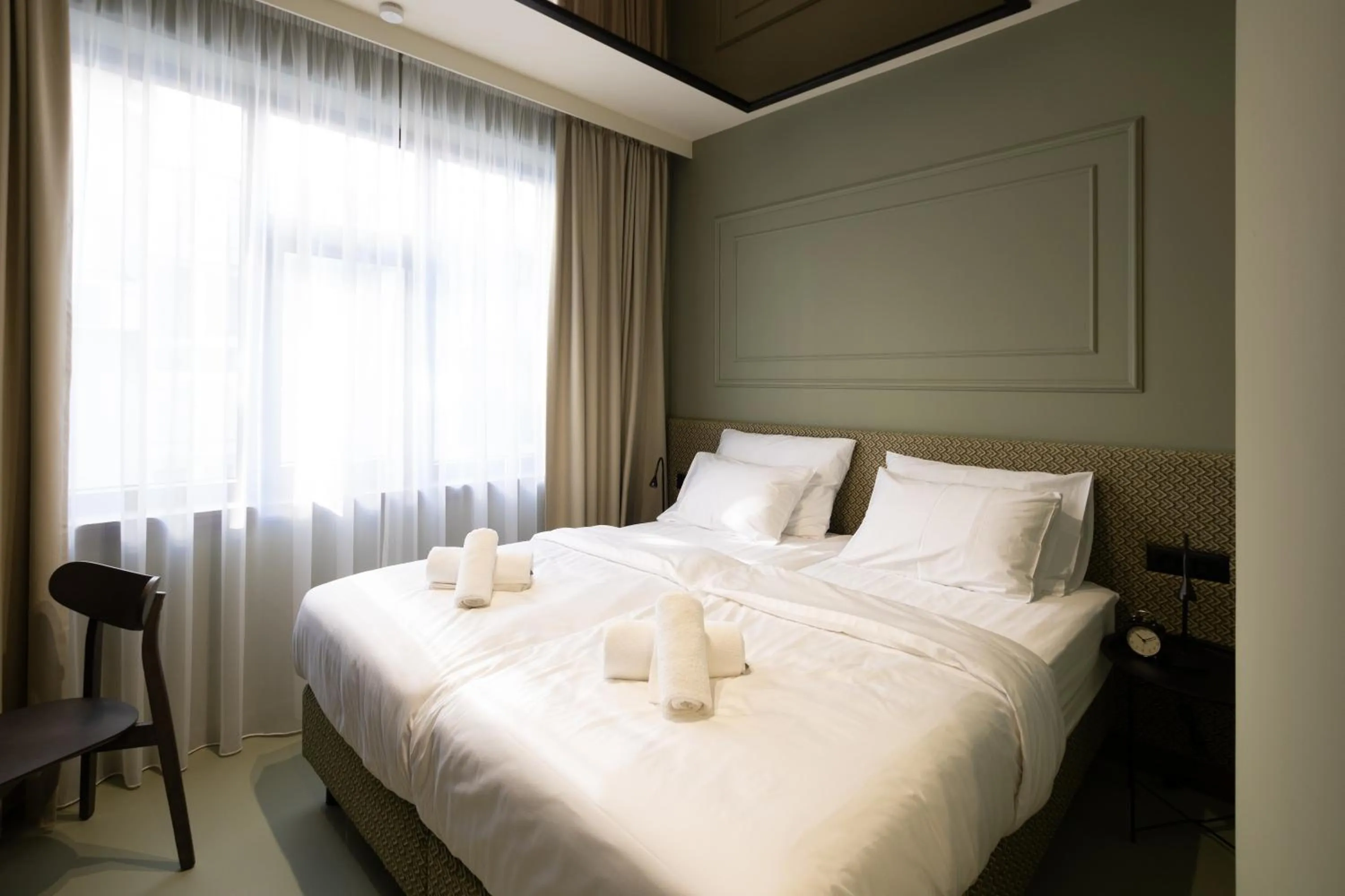 Bed in Boutique Hotel OPERA
