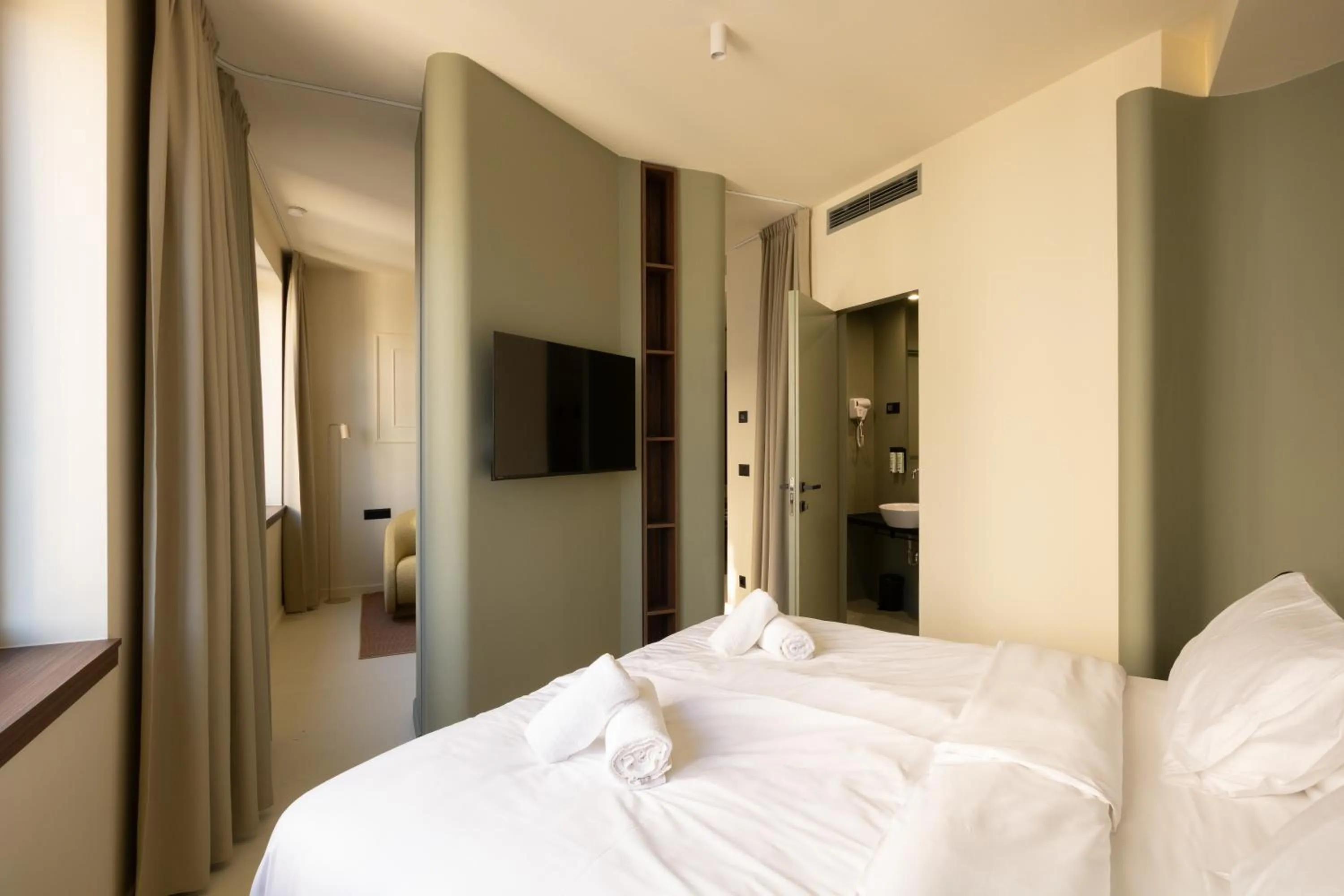 Bed in Boutique Hotel OPERA
