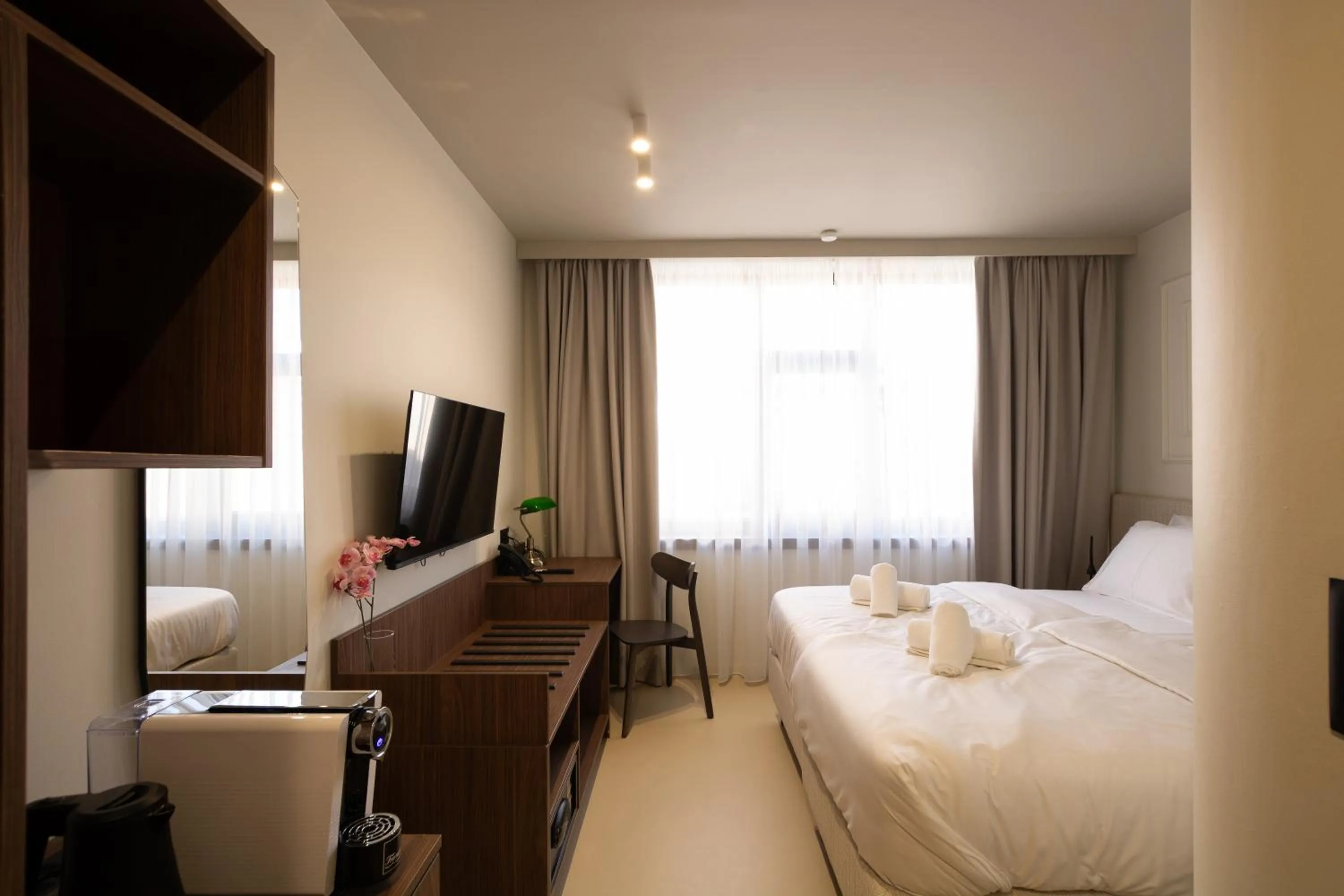 Bed in Boutique Hotel OPERA