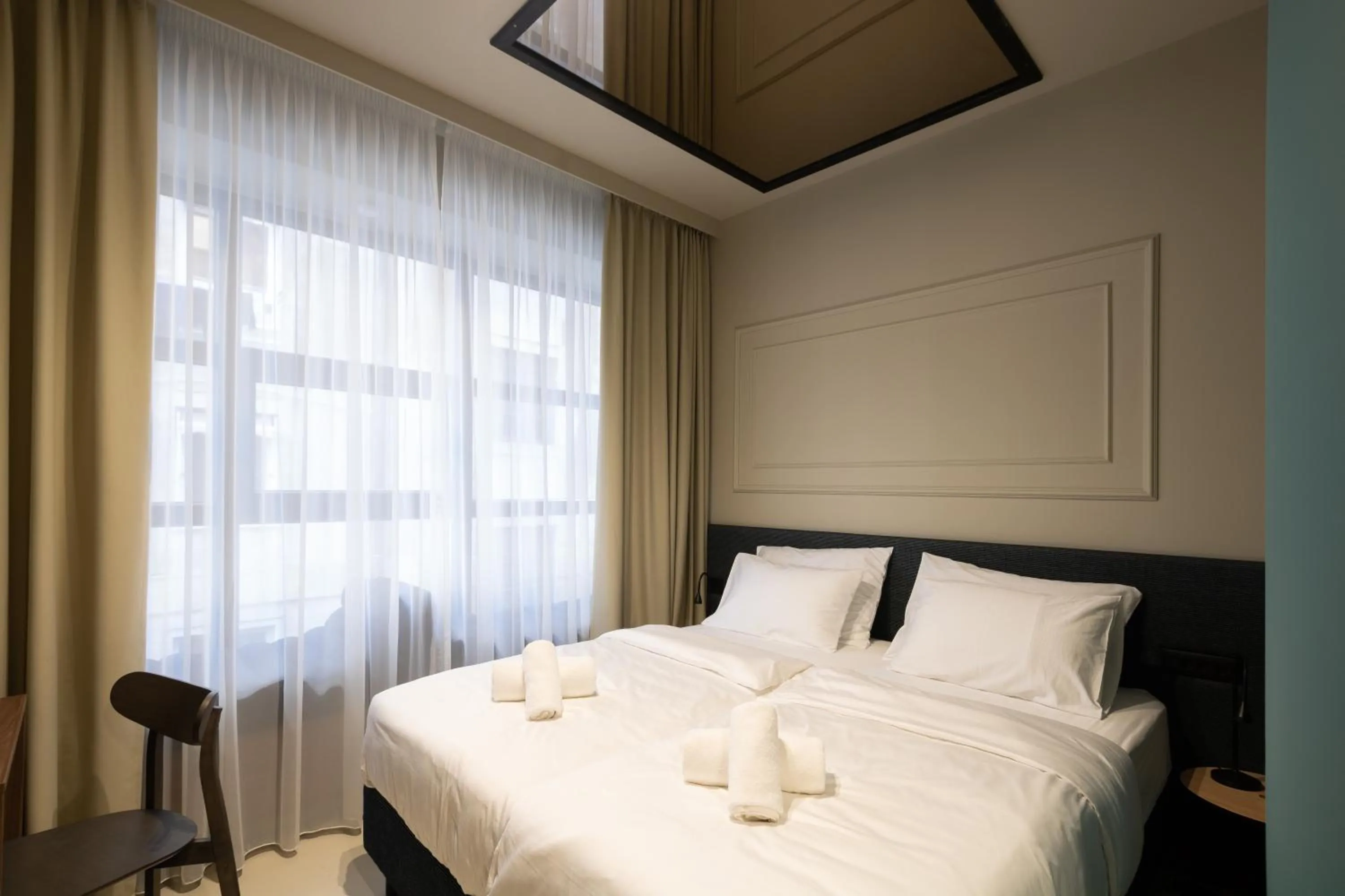 Bed in Boutique Hotel OPERA