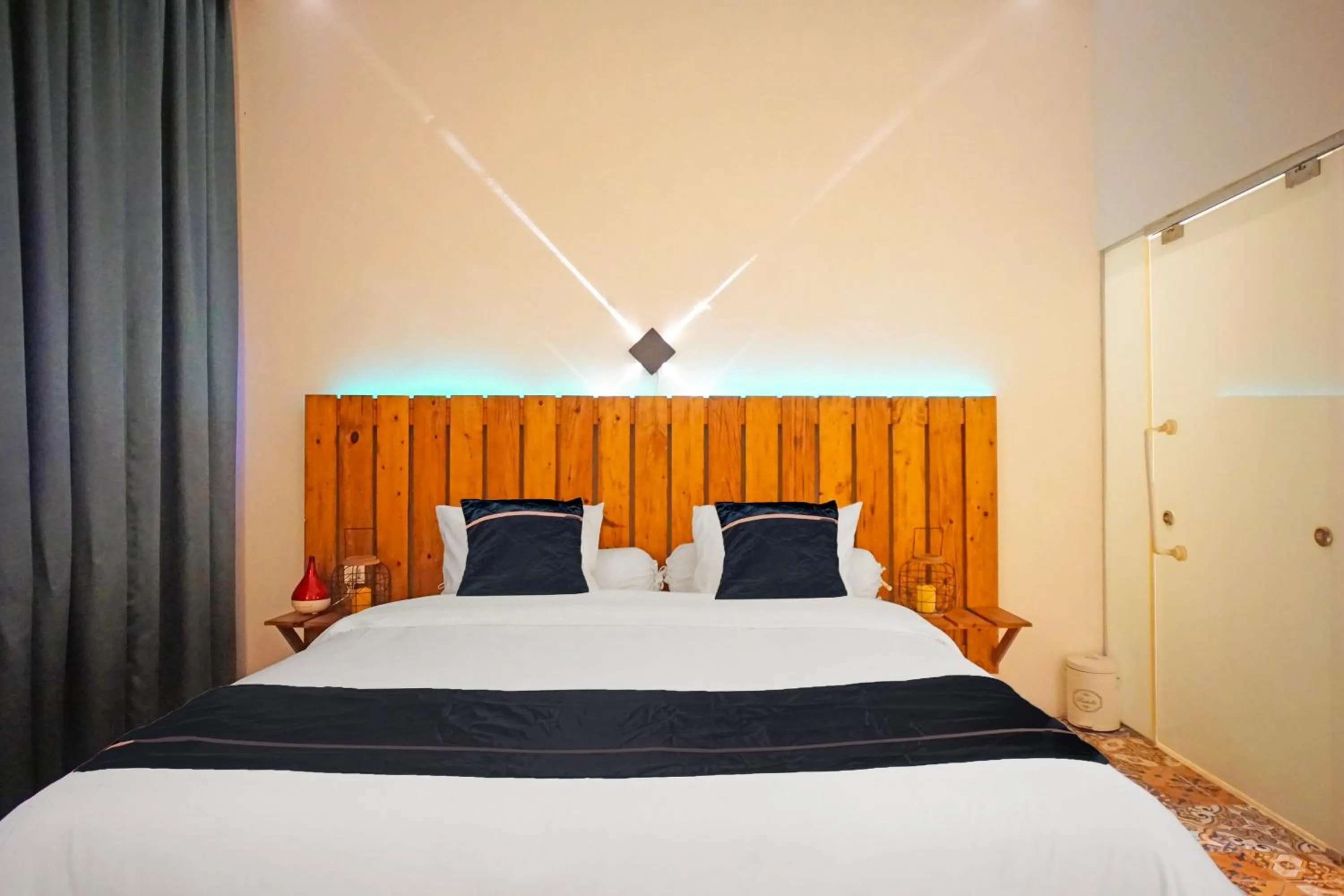 Bedroom, Bed in Hotel O near Ringroad City Walk XXI formerly Mitrotel Medan