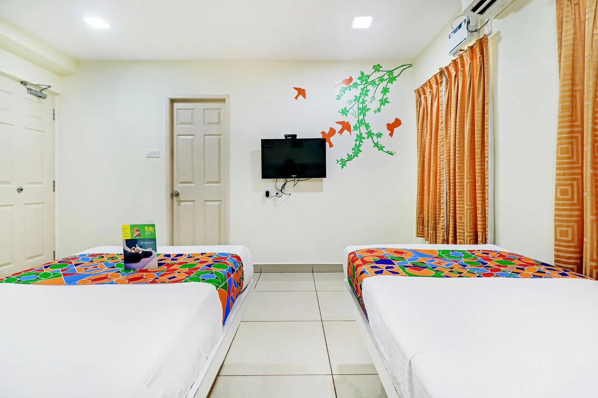 Bed in Fabhotel Colors Service Apartment - Nr MRC Nagar