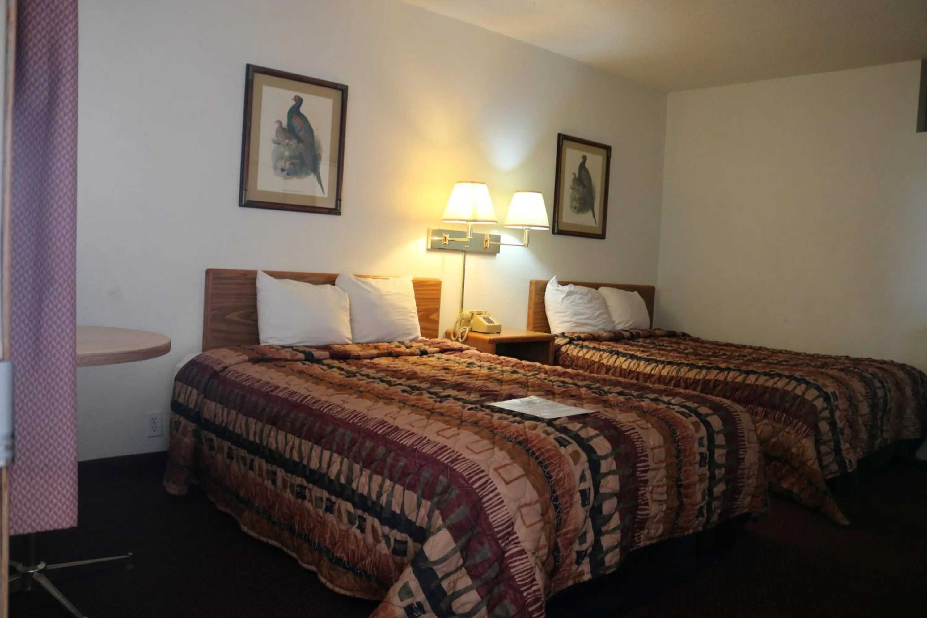 Bed in Dakota Inn