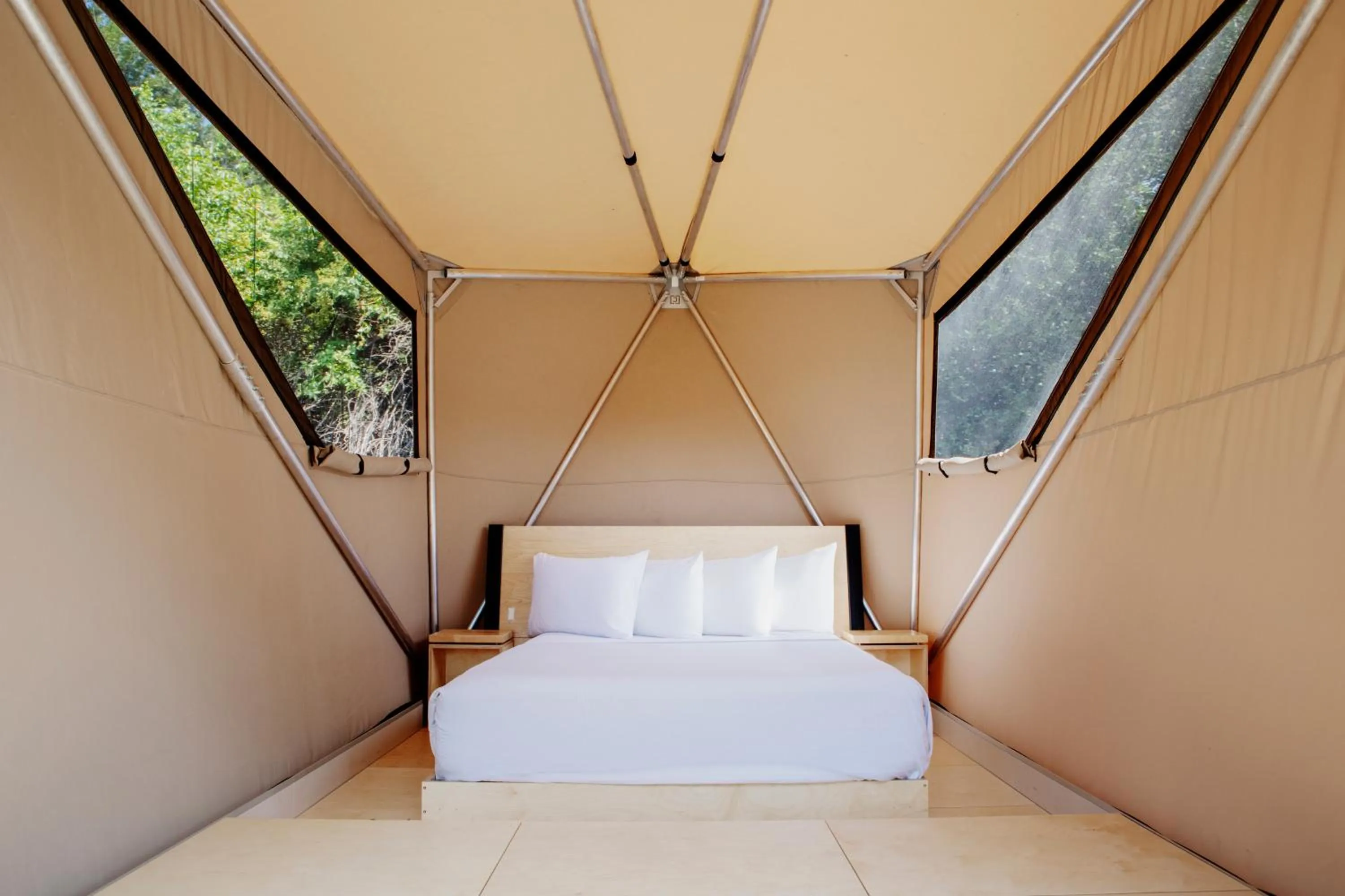 Bed in Flying Flags RV Resort & Campground