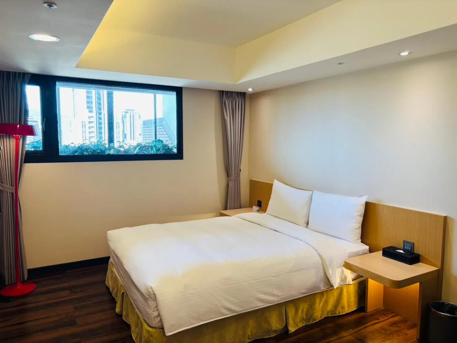 Bed in Eastin Taipei Hotel