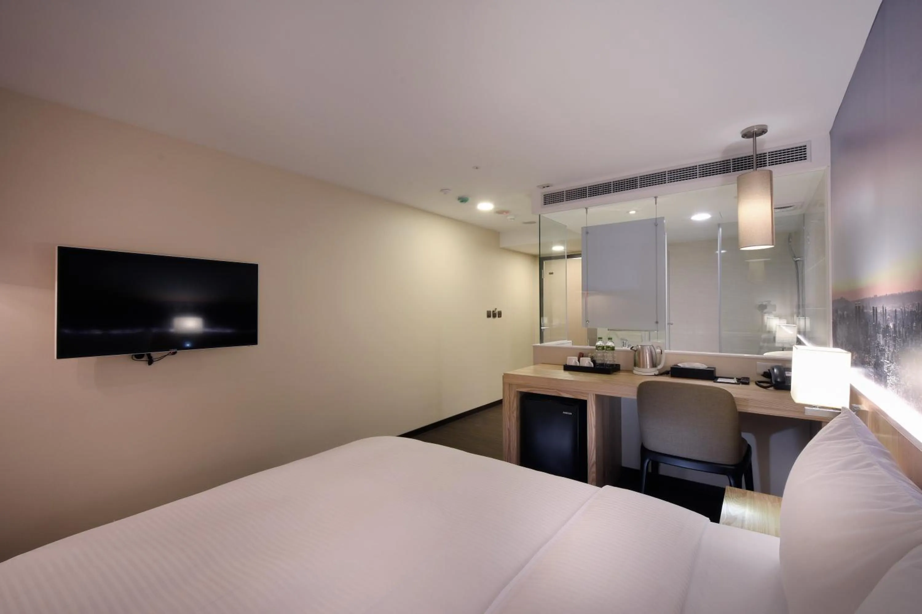 Bed in Eastin Taipei Hotel