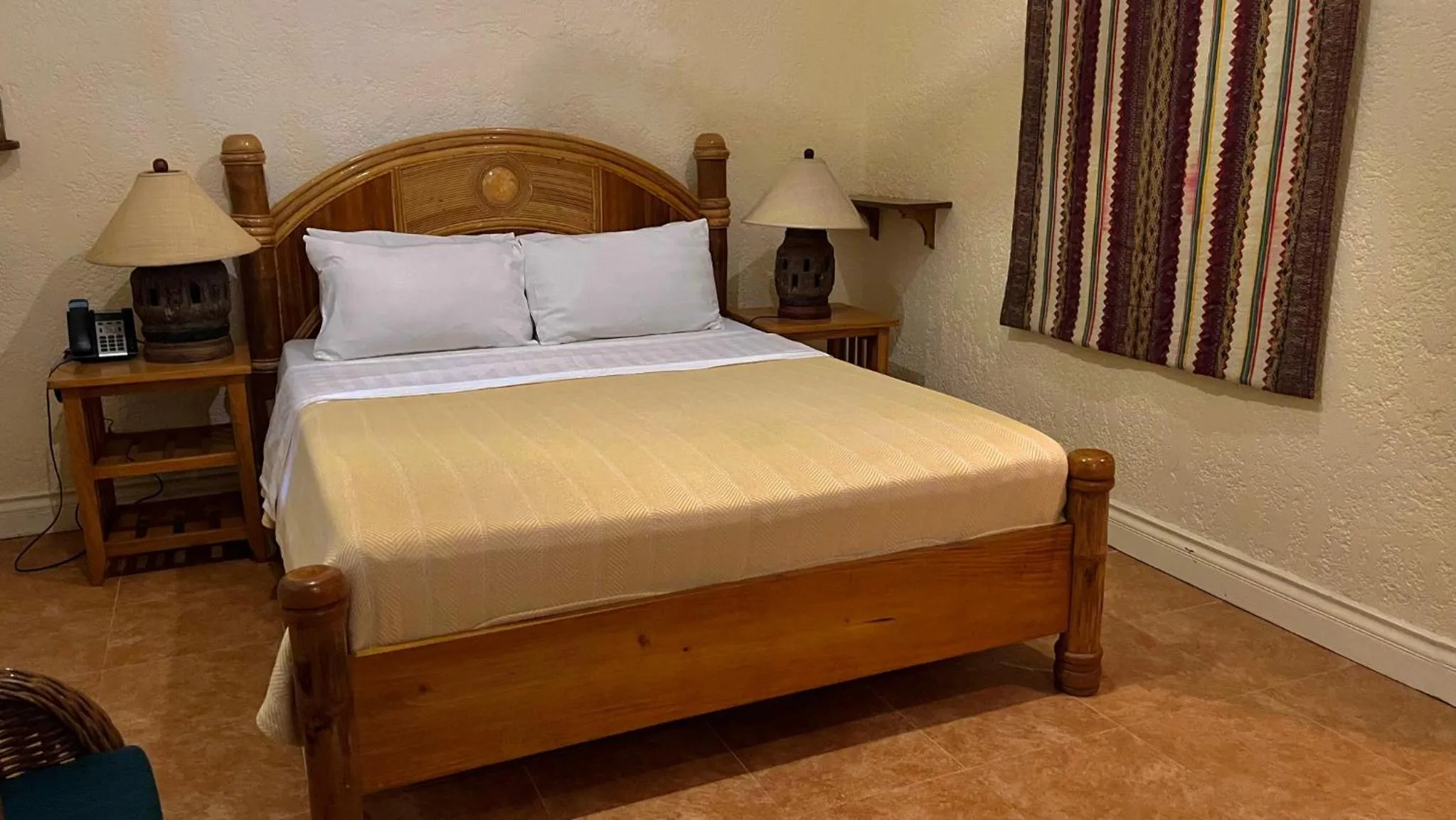 Bed in Coco Grove Beach Resort, Siquijor Island