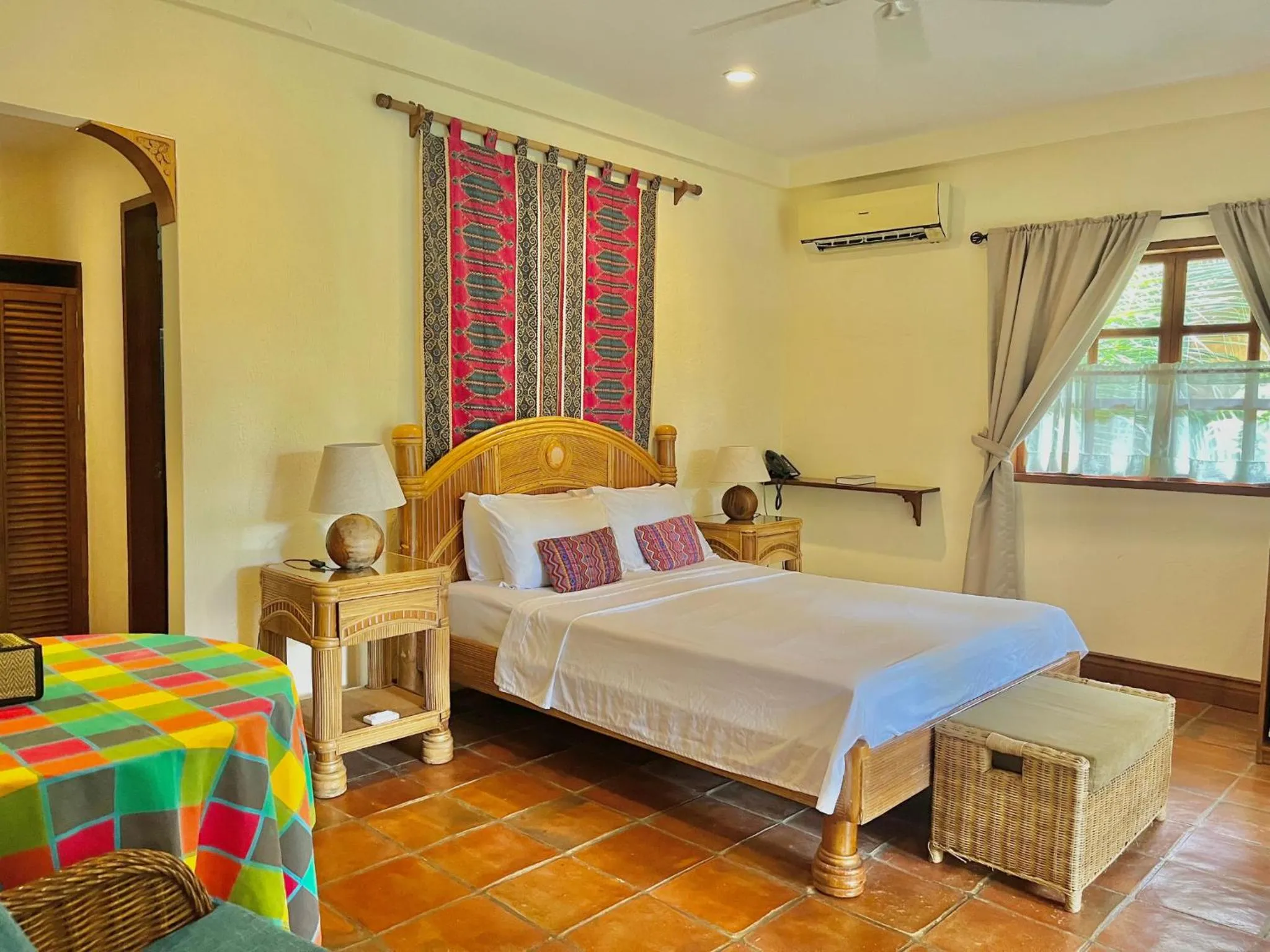 Bed in Coco Grove Beach Resort, Siquijor Island