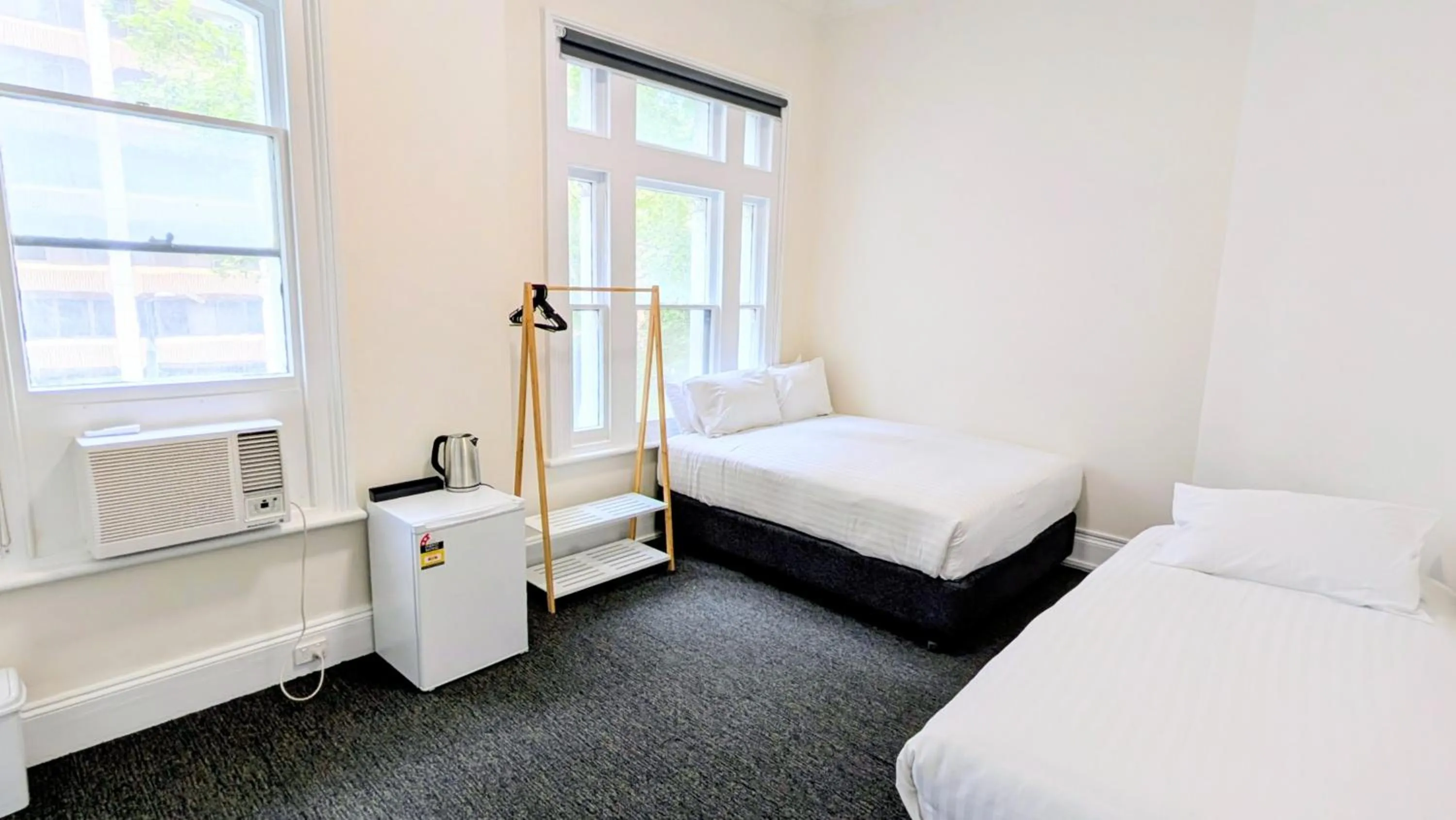 Bed in Ambassadors Hotel