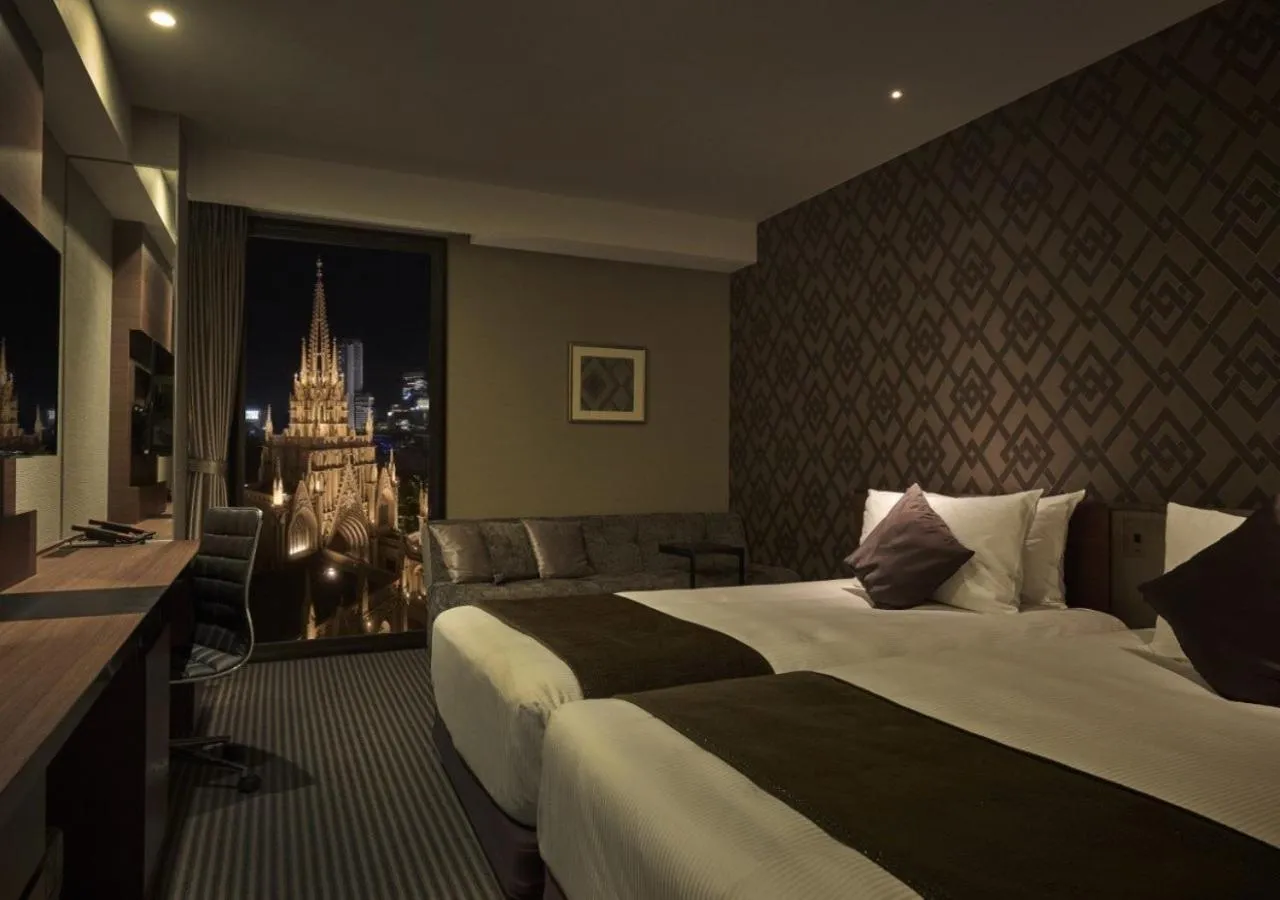 Photo of the whole room, Bed in The Strings Hotel Nagoya