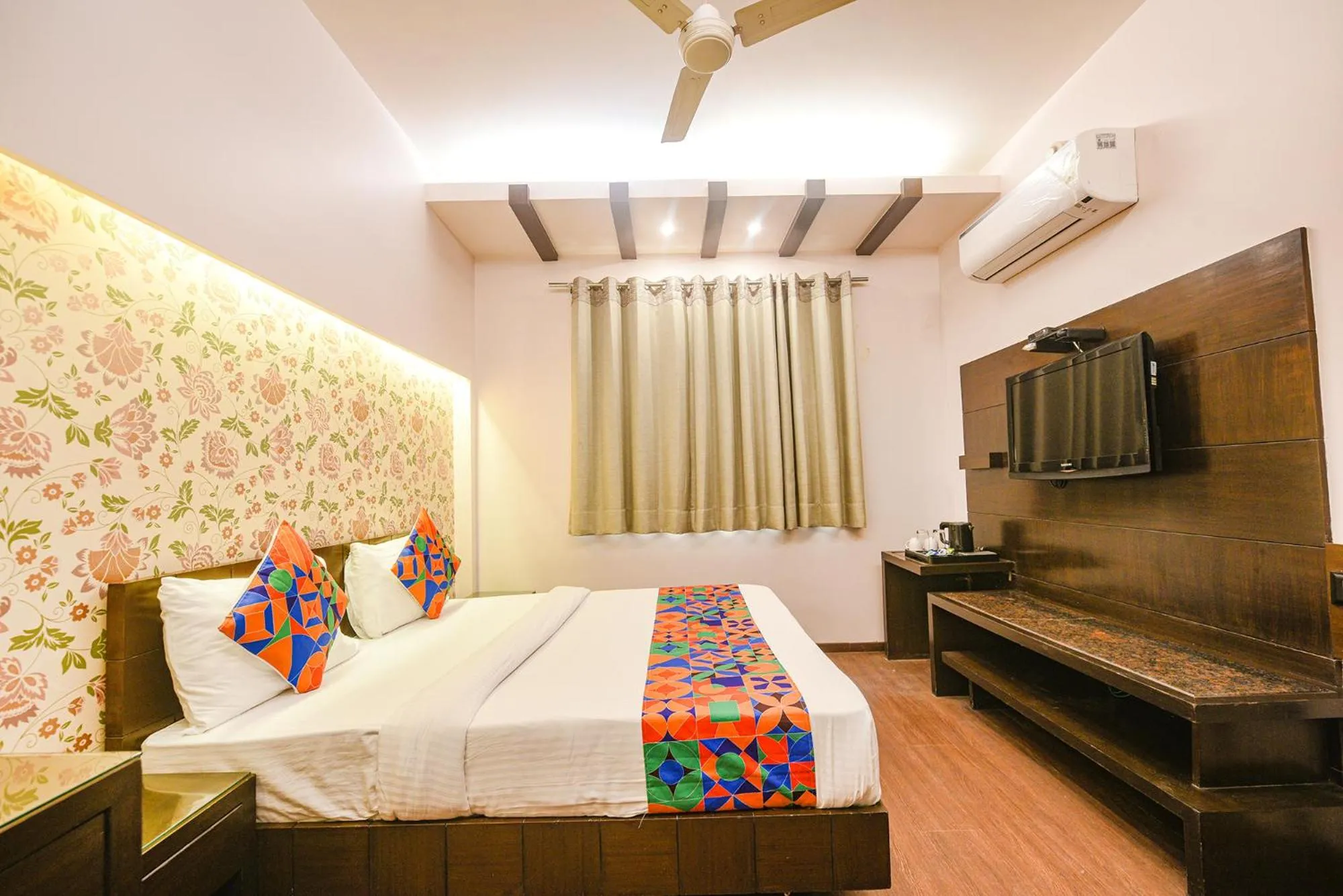Bed in FabHotel Aashraye