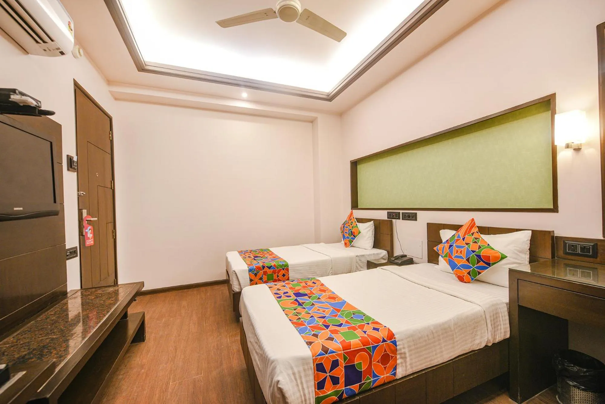 Bed in FabHotel Aashraye