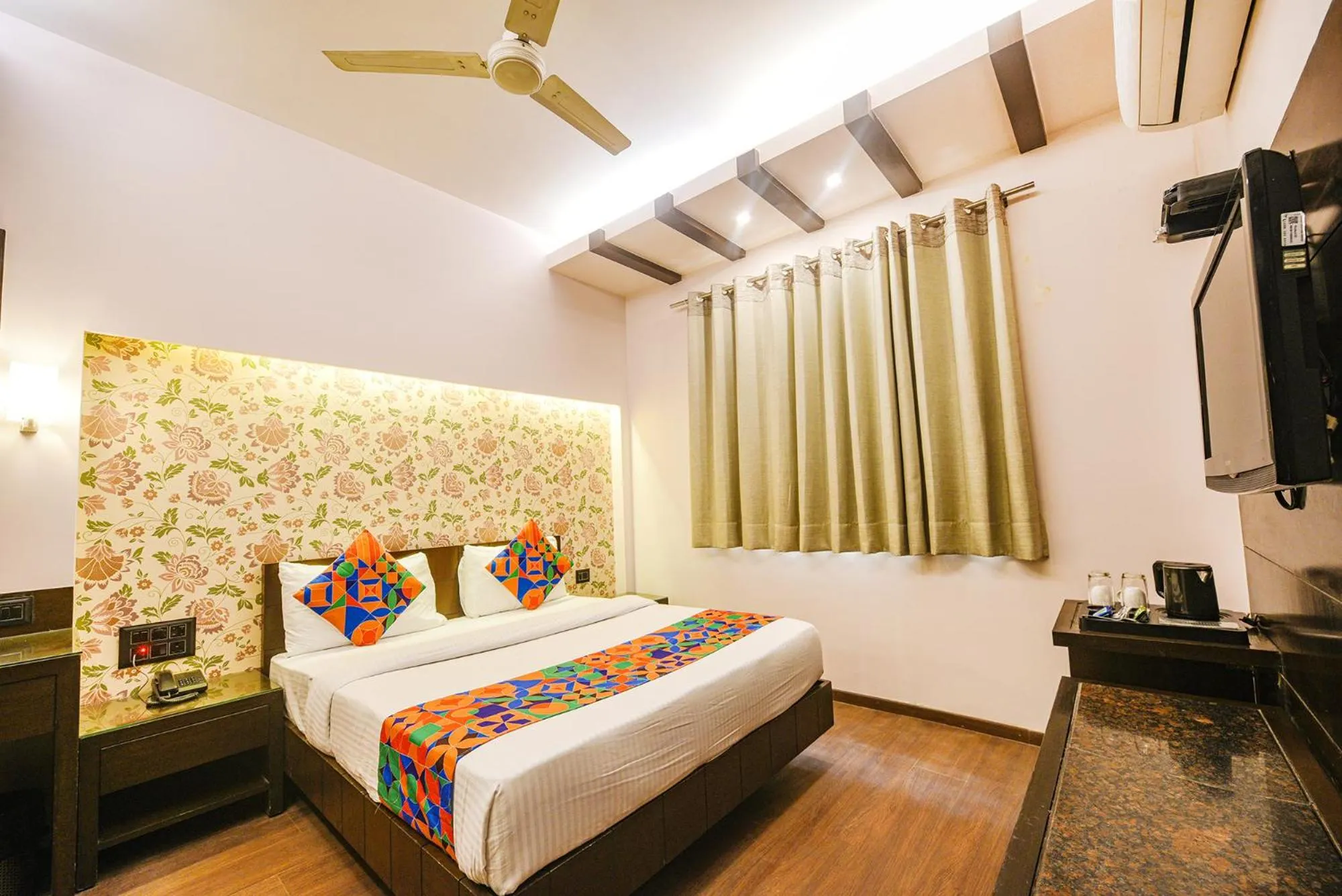 Bed in FabHotel Aashraye