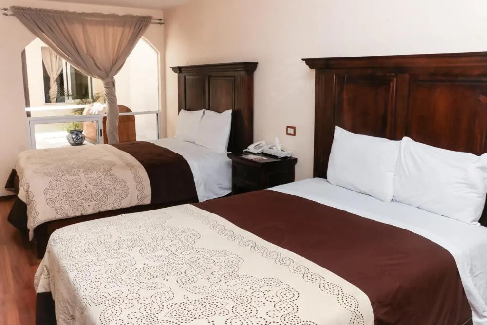 Bed in Hotel Boutique Xelhua