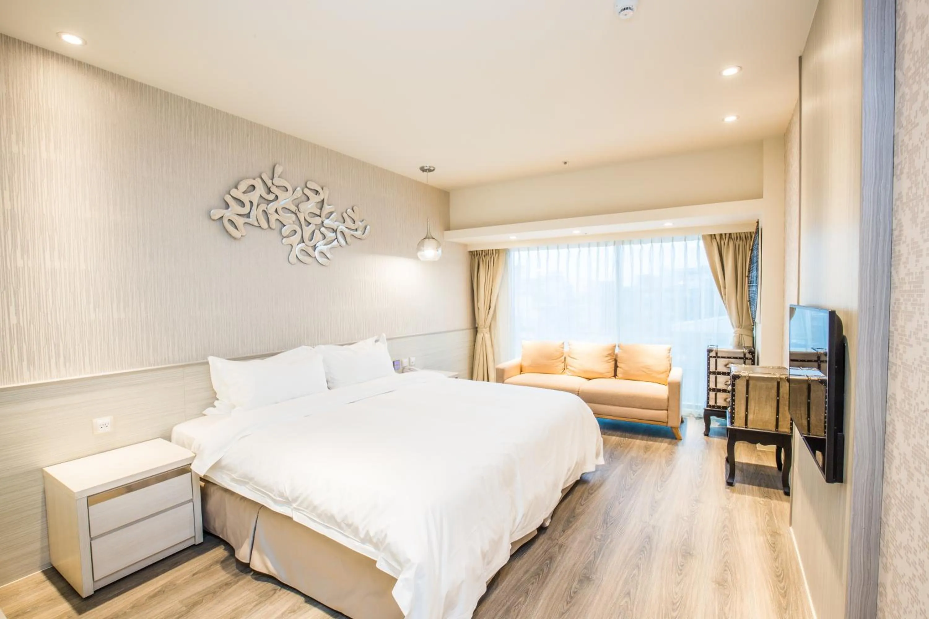 Bed in Walker Hotel. Ximen