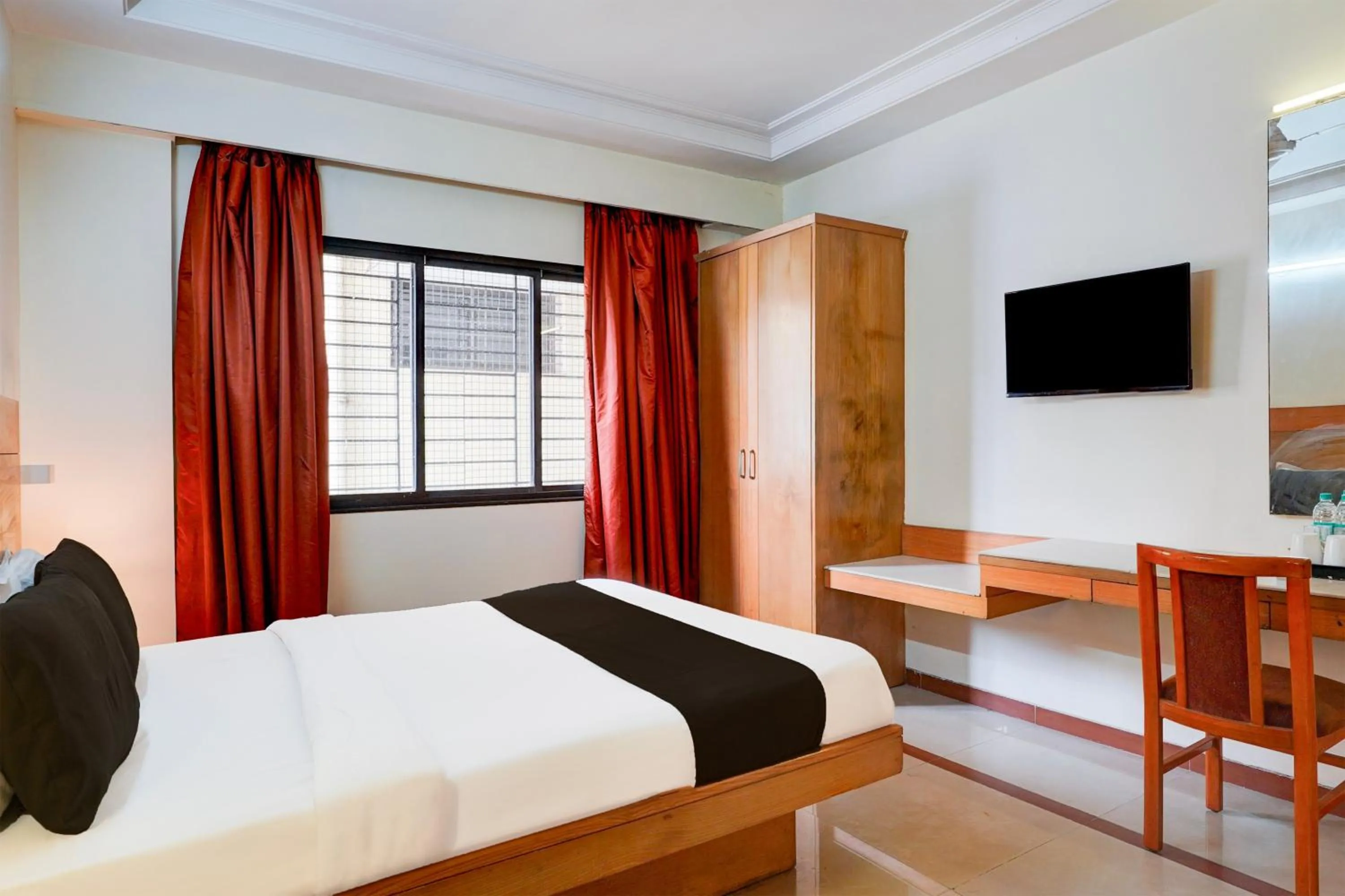 Bedroom, Bed in Super Hotel O Thimmaiah Rd Rajajinagar