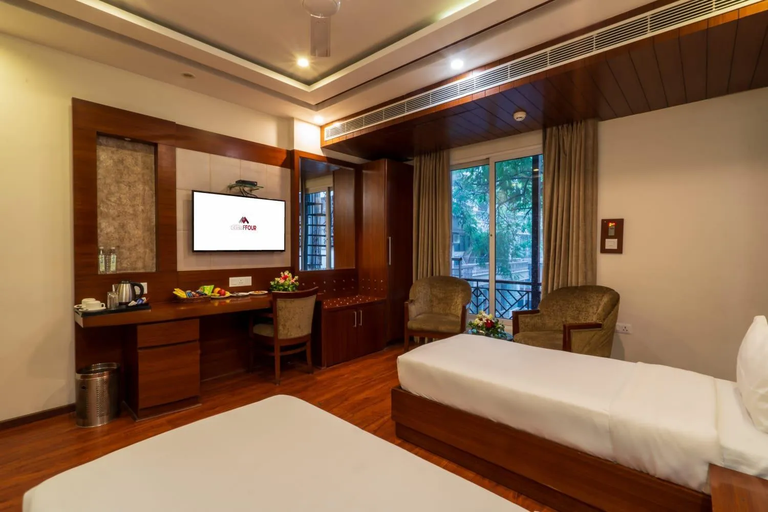 Photo of the whole room, Bed in Grand FFOUR near Nehru Place, Delhi