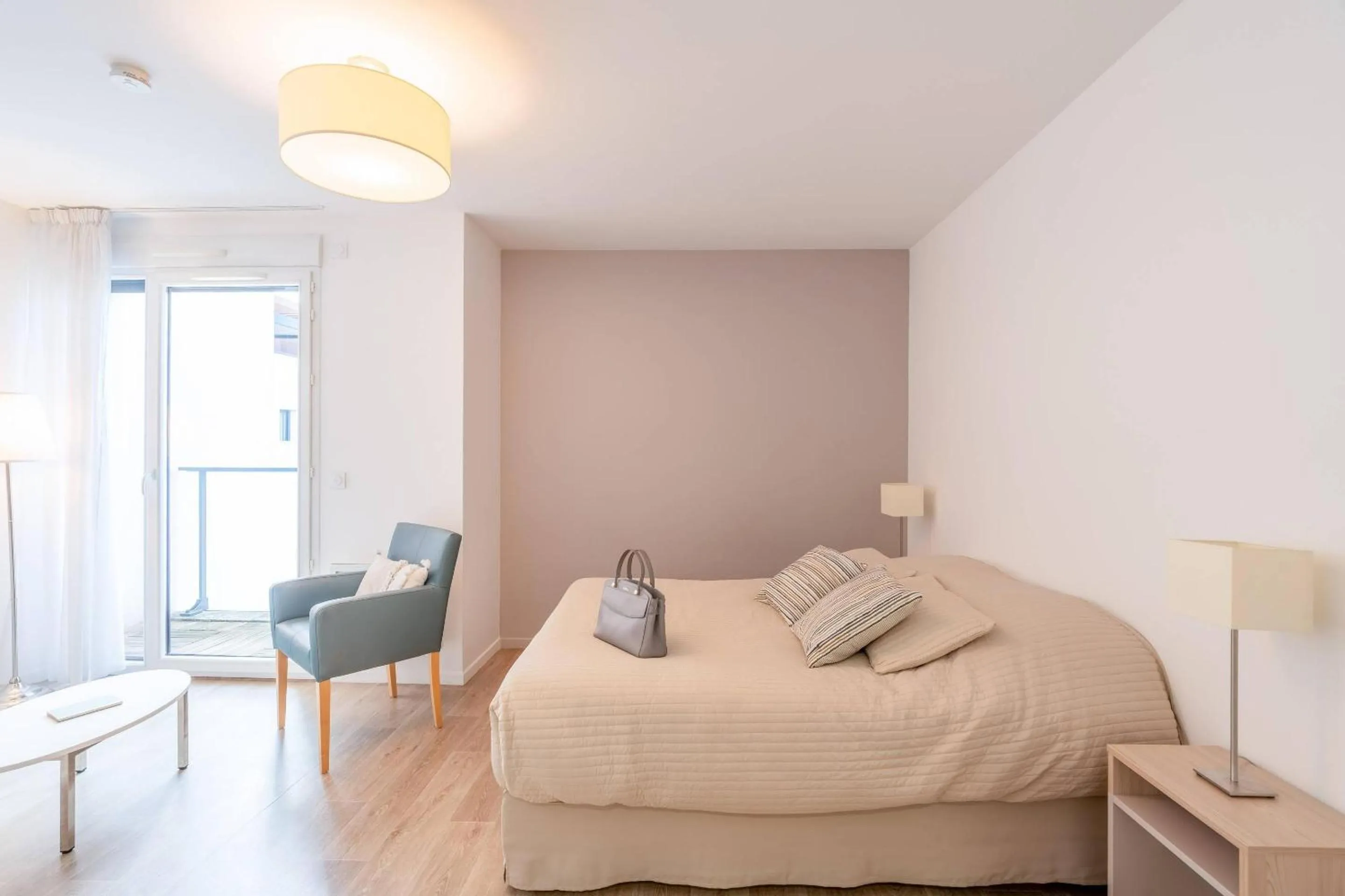 Seating area, Bed in Quality Aparthotel Bourgoin-Jallieu