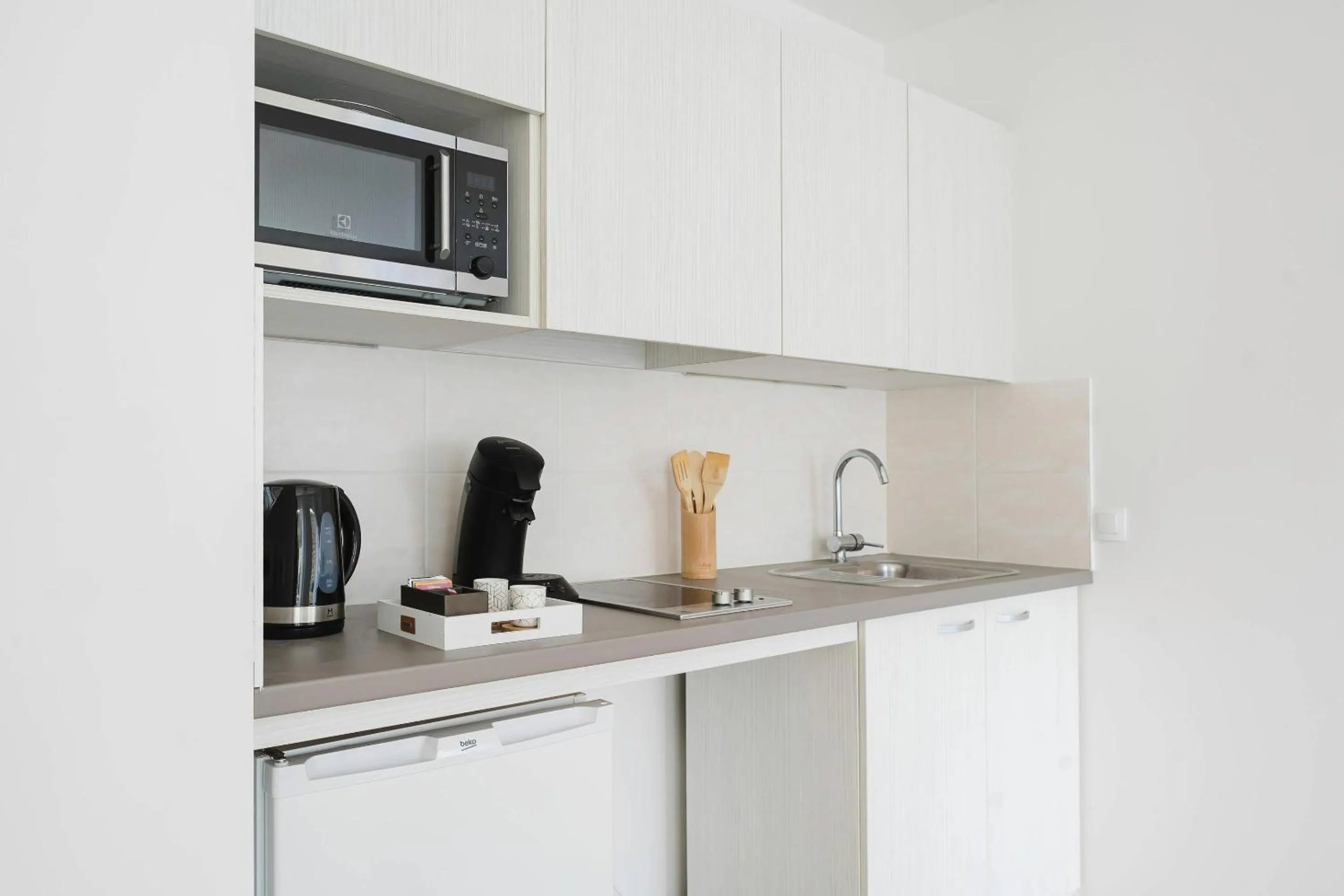 Kitchen or kitchenette in Quality Aparthotel Saint-Malo