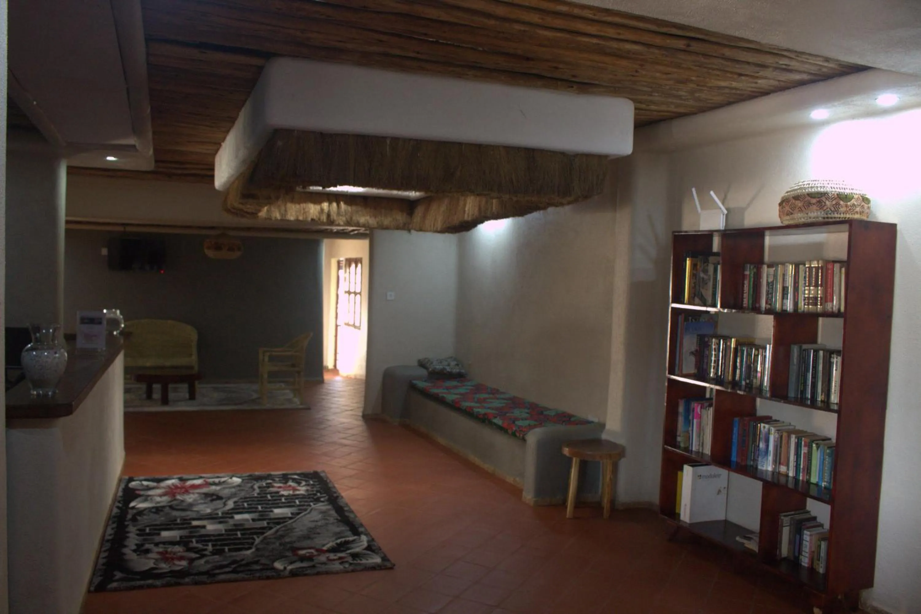 Communal lounge/ TV room in Montane Safaris Hotel, Entebbe