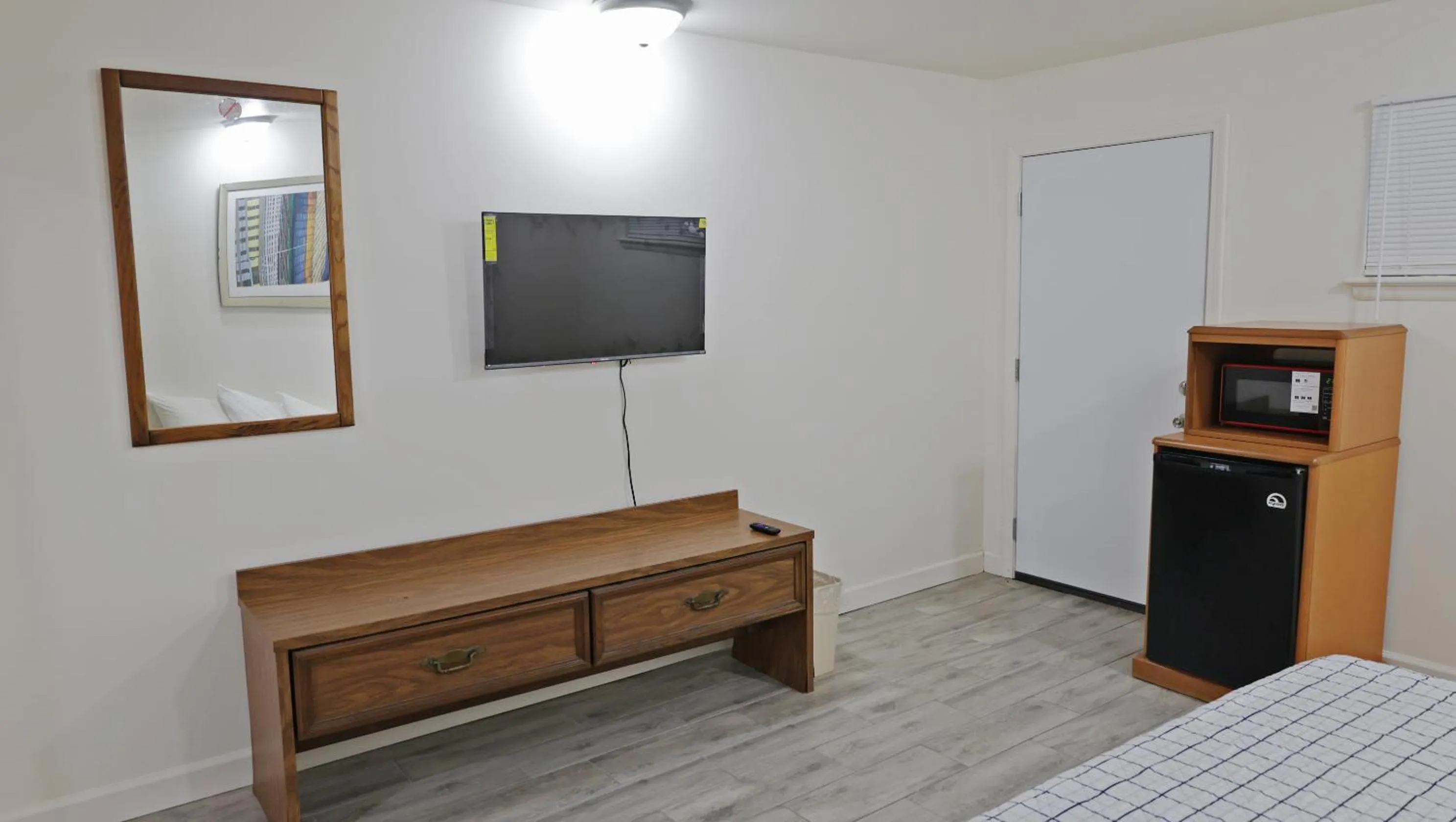 Bed in Sawmill Lodges Motel