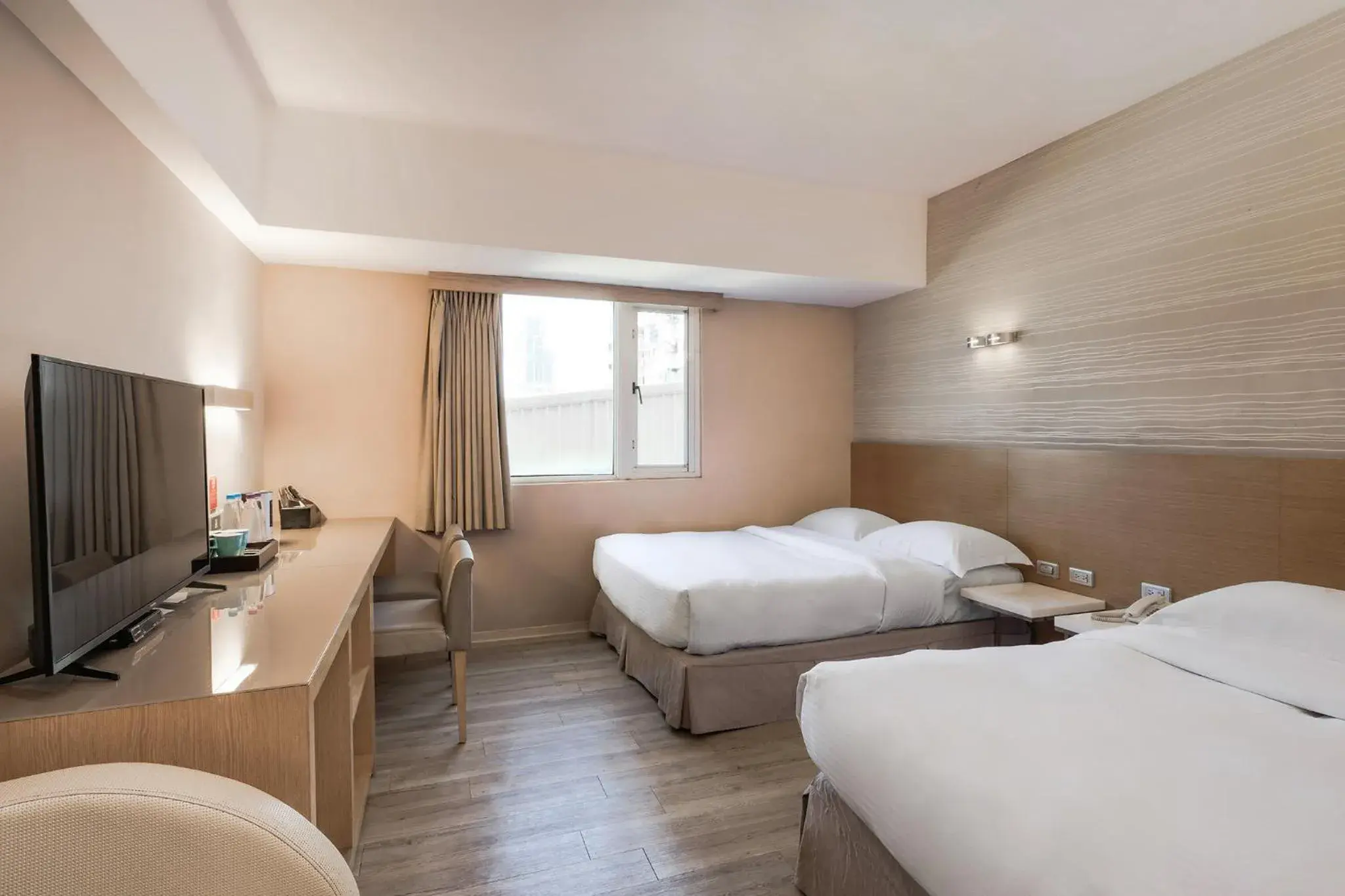 Economy Quadruple Room in The Riverside Hotel Esthetics Economy Quadruple Room in The Riverside Hotel Esthetics