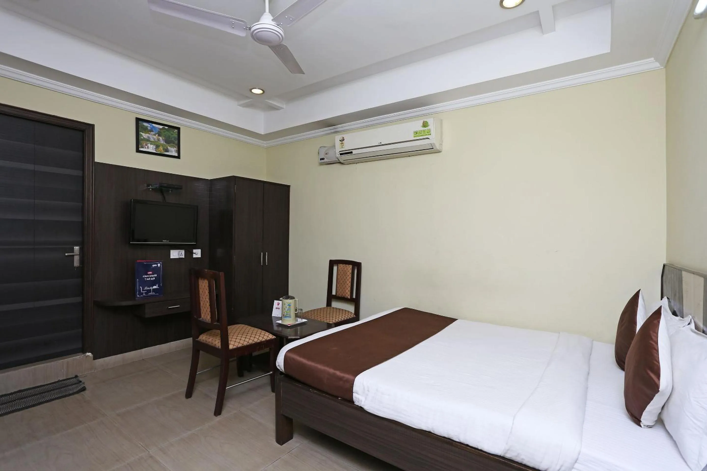 Bedroom, Bed in Hotel O Saraswathi Residency Near SR Nagar Metro Station