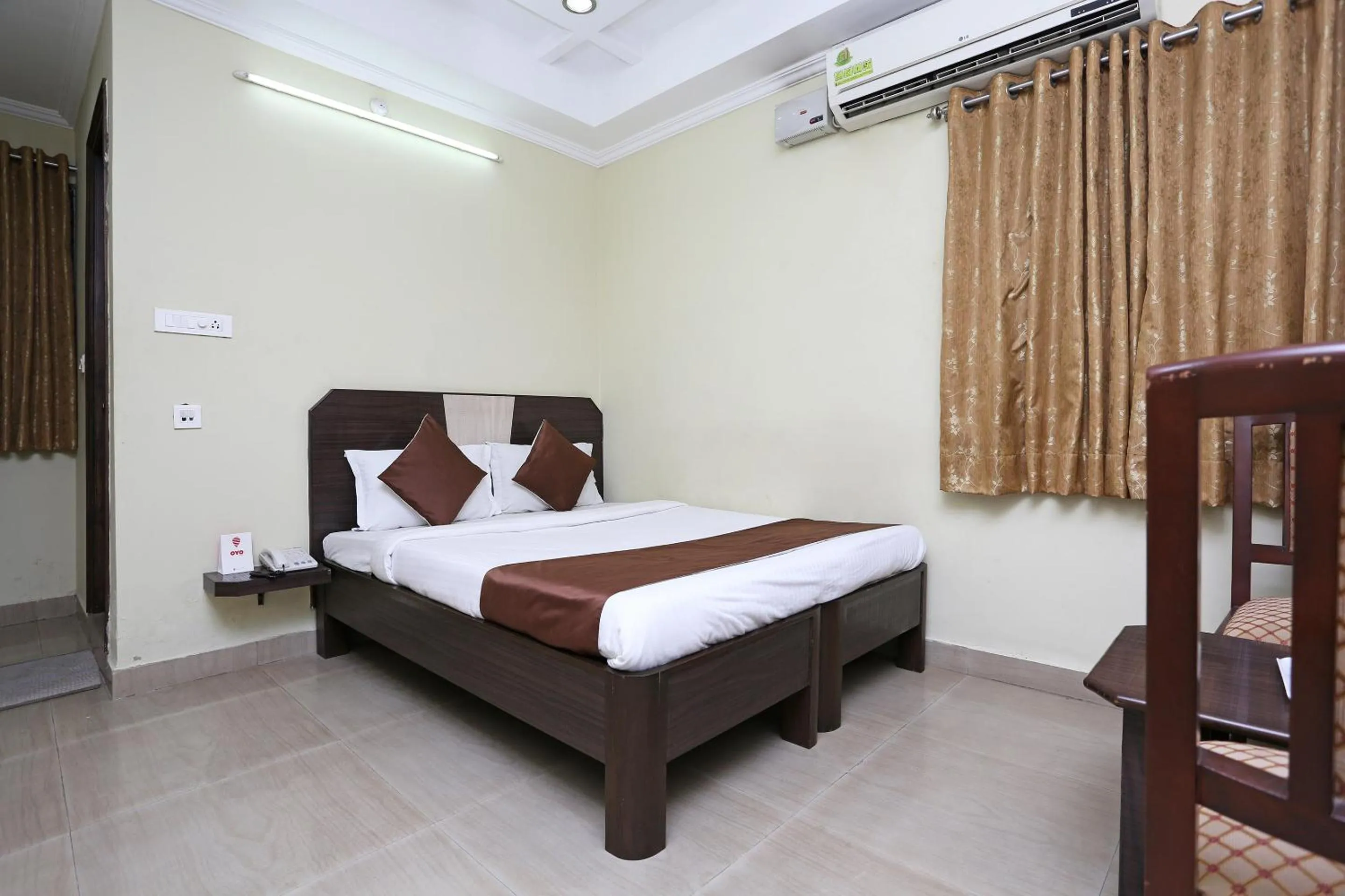 Bedroom, Bed in Hotel O Saraswathi Residency Near SR Nagar Metro Station
