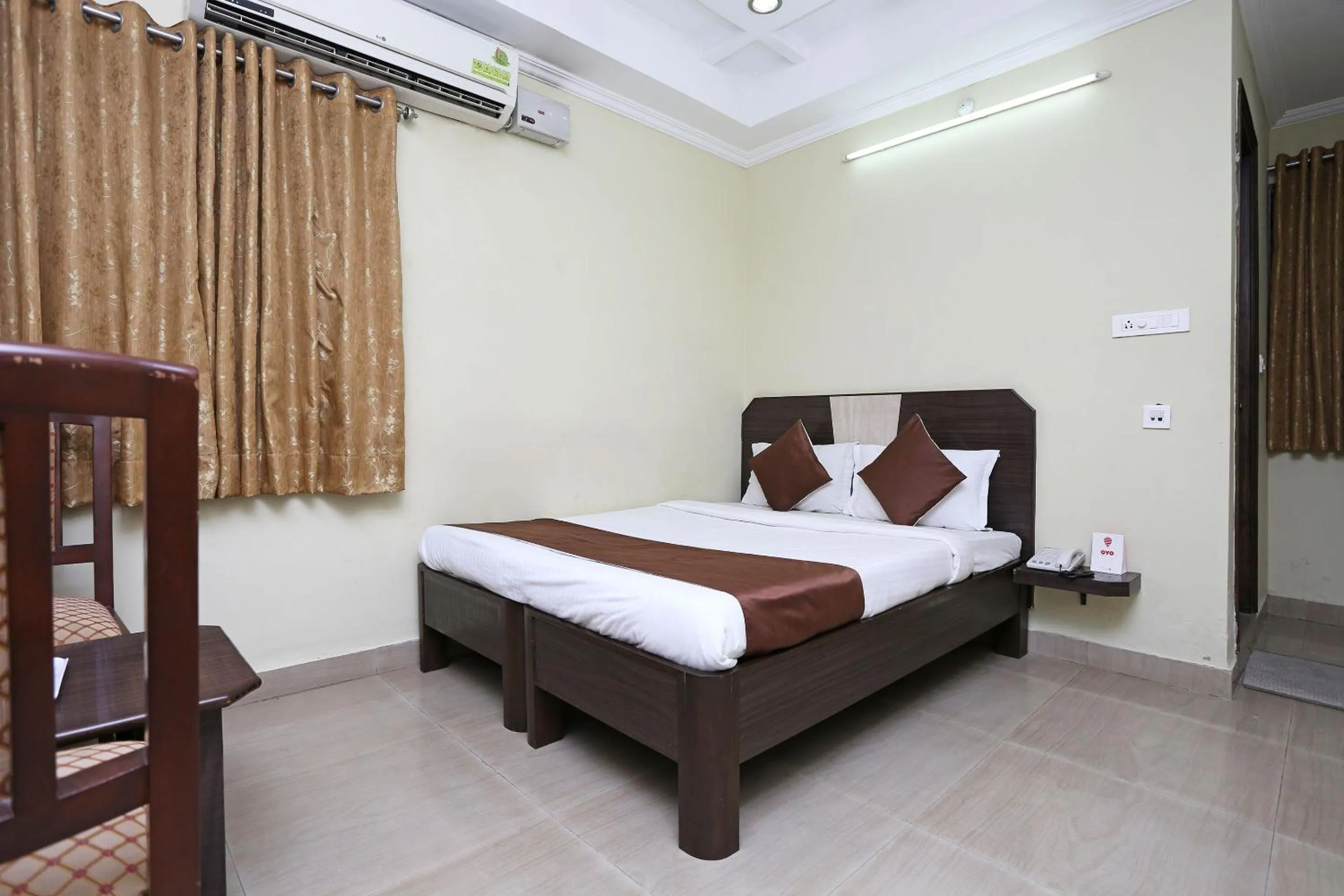 Bedroom, Bed in Hotel O Saraswathi Residency Near SR Nagar Metro Station