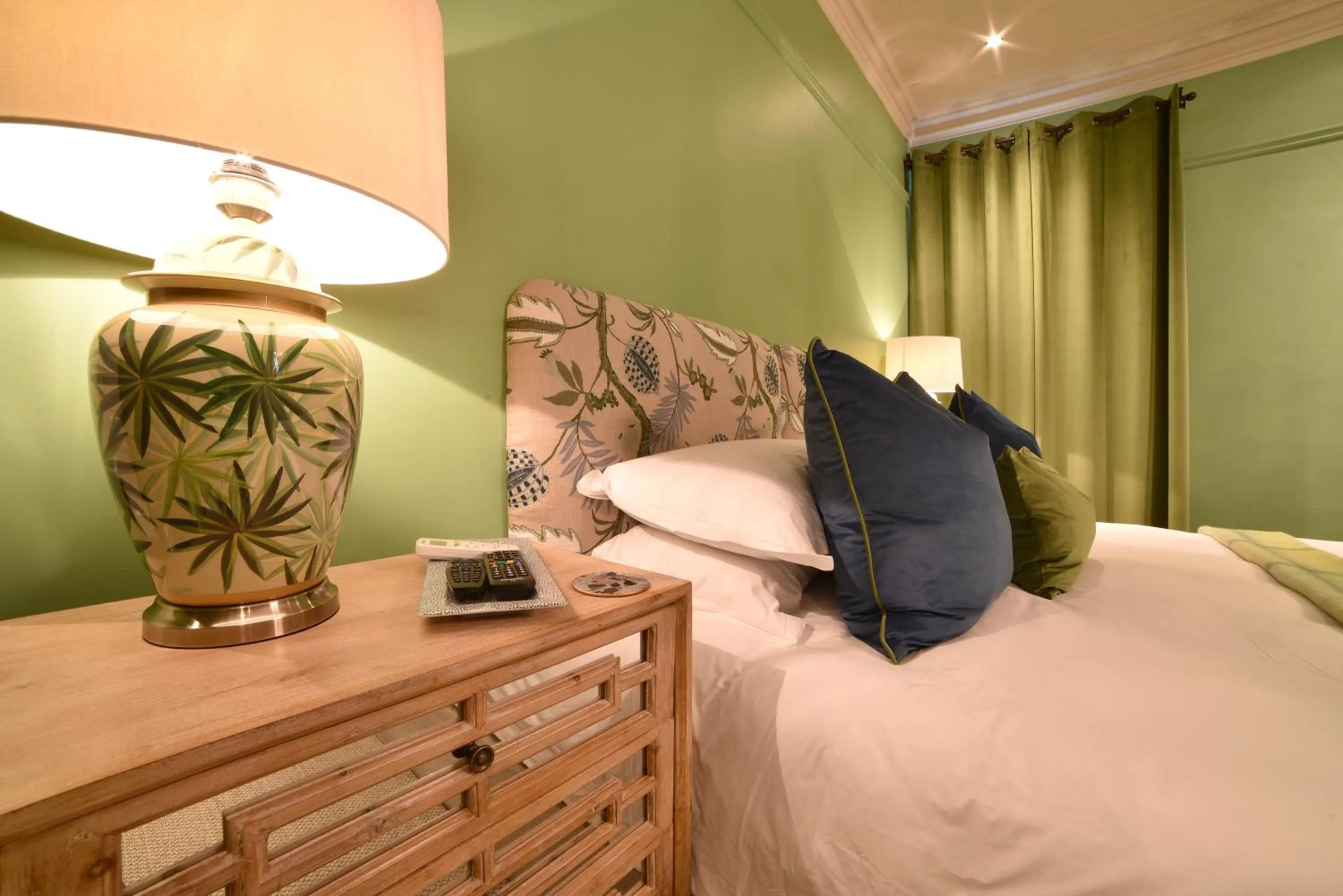 Bed in La Fontaine Boutique Hotel by The Oyster Collection