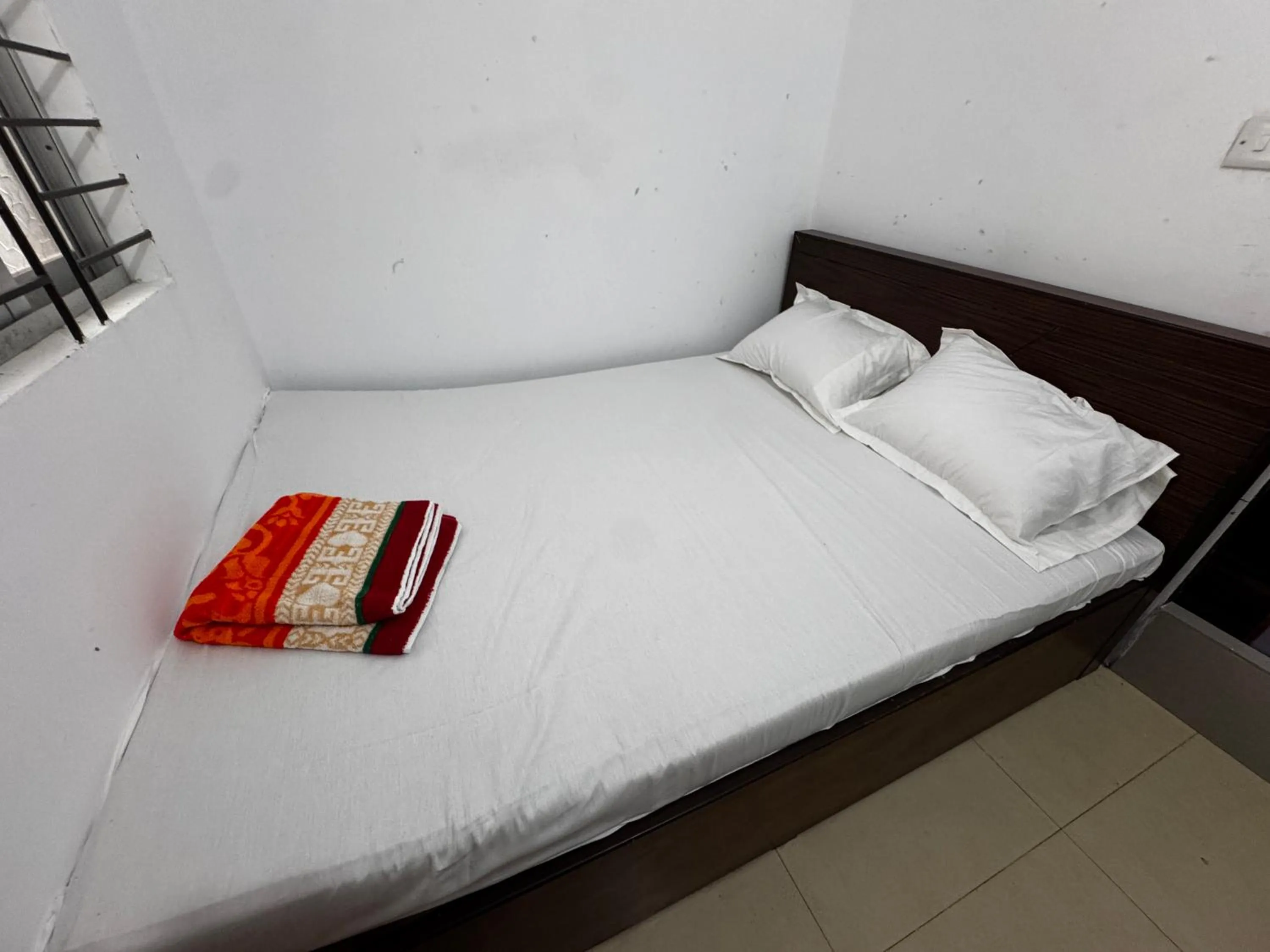 Bed in Hotel Labbaik Farmgate