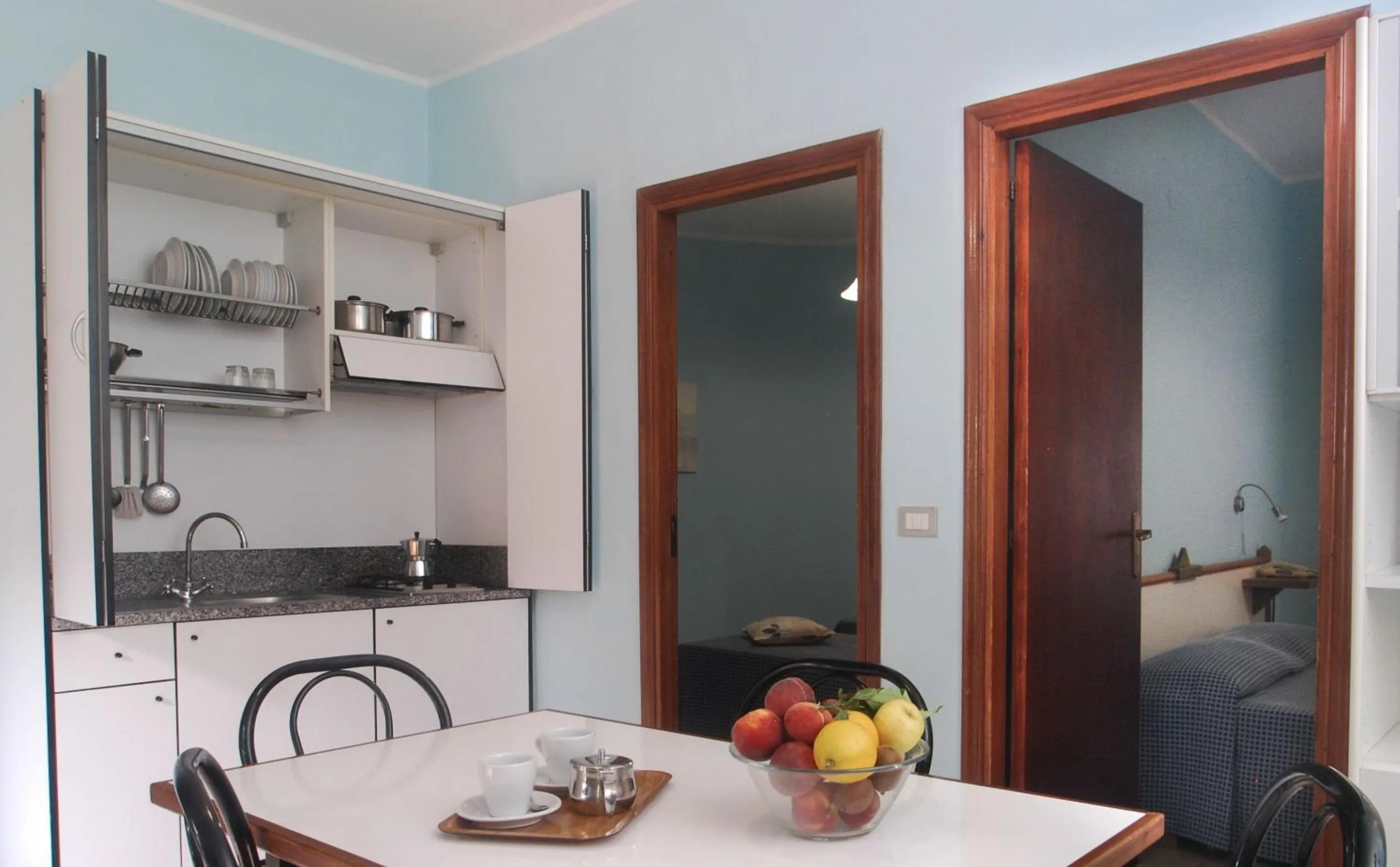 Kitchen or kitchenette in Villaggio Turistico La Mantinera - Residence