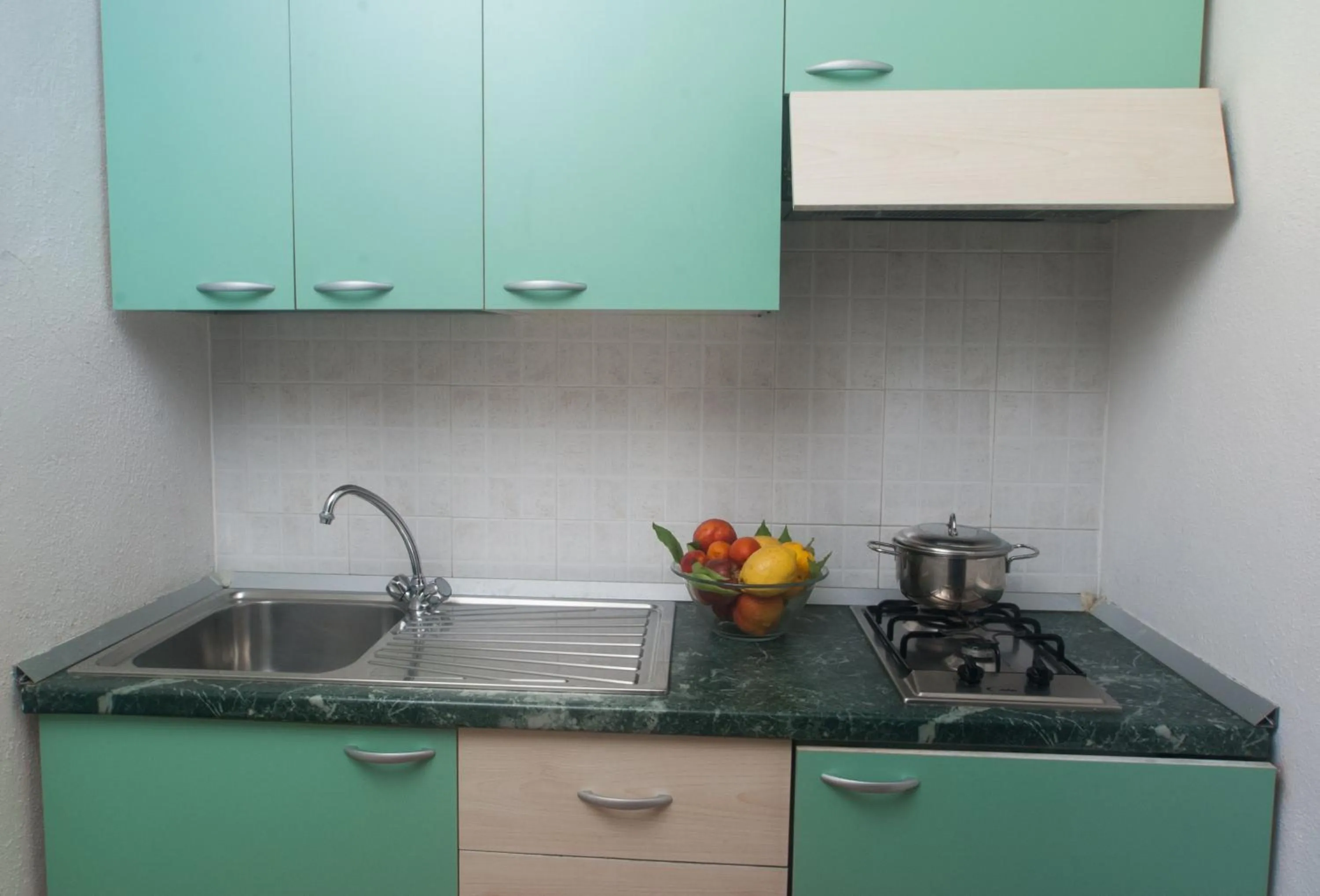 Kitchen or kitchenette in Villaggio Turistico La Mantinera - Residence