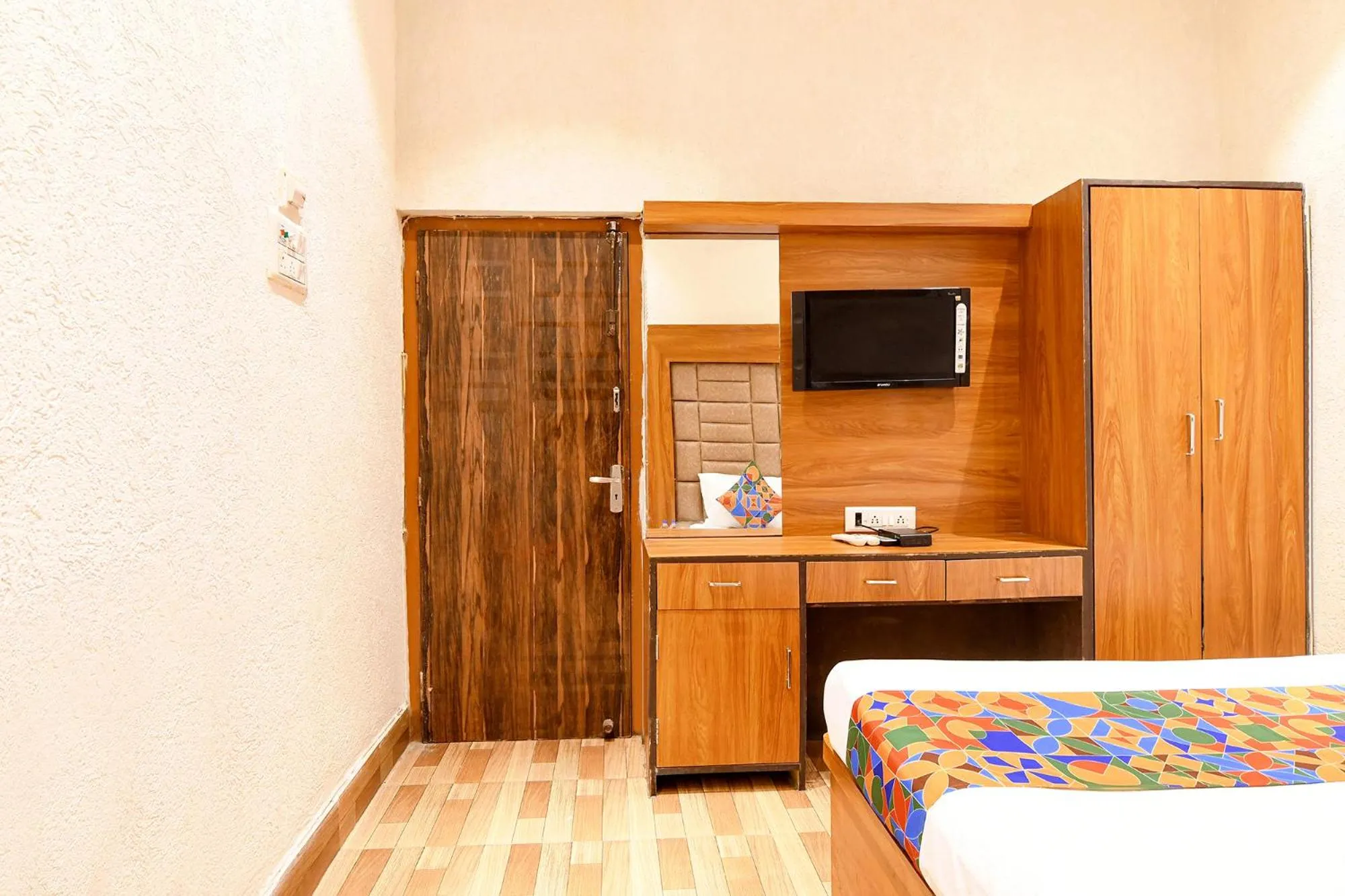 Bed in FabHotel Marina