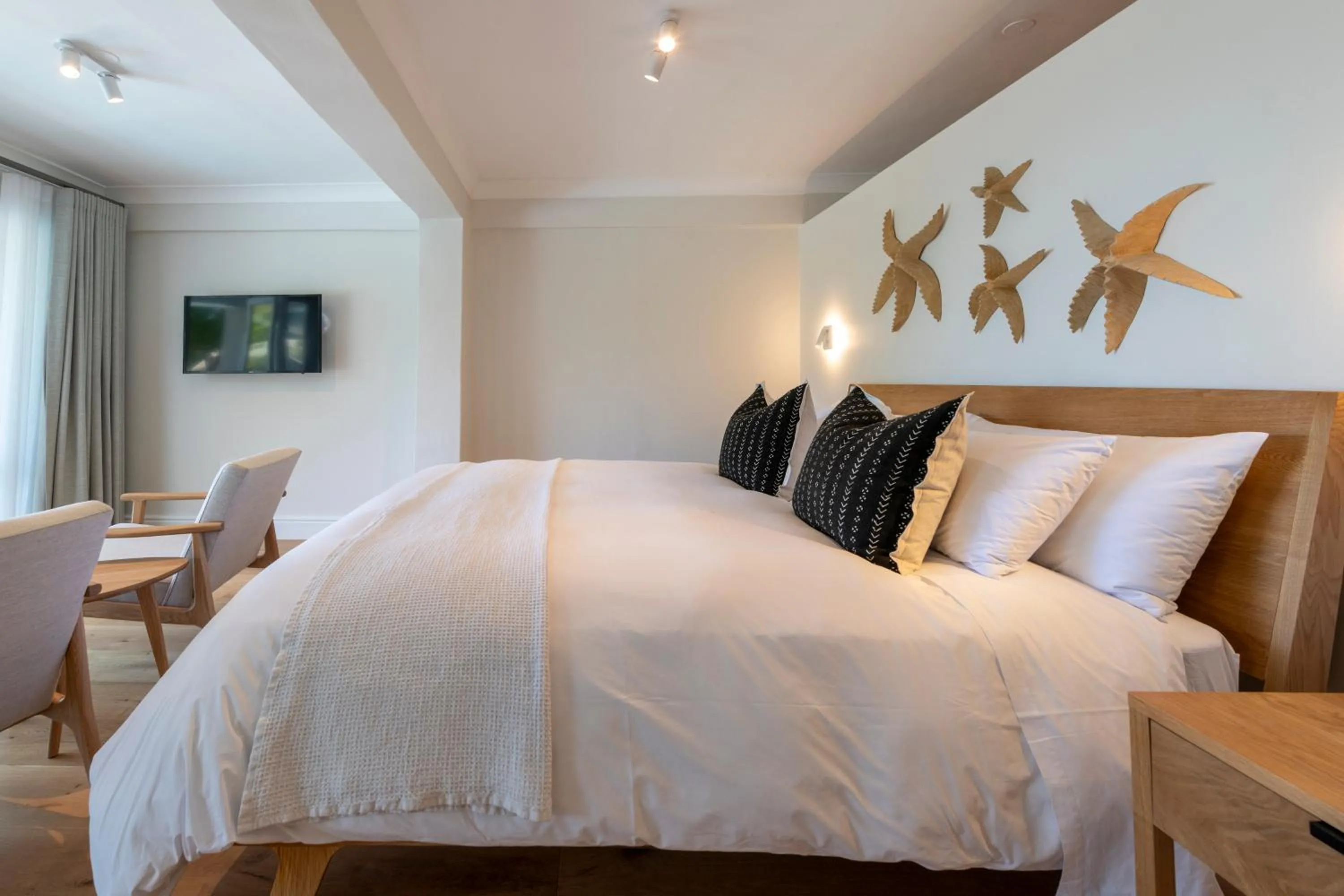 Bed in Hide-Away Guest House