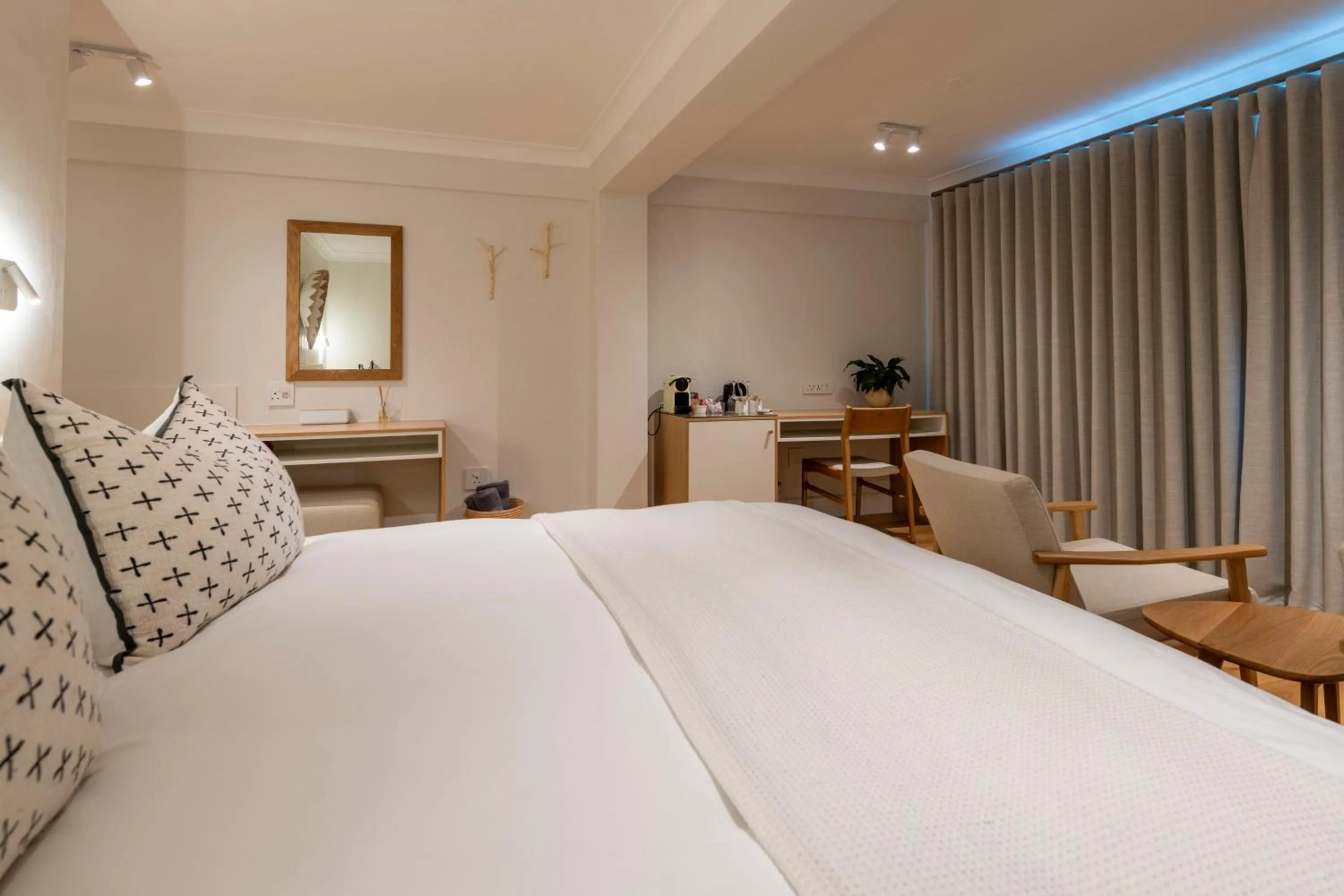 Bed in Hide-Away Guest House