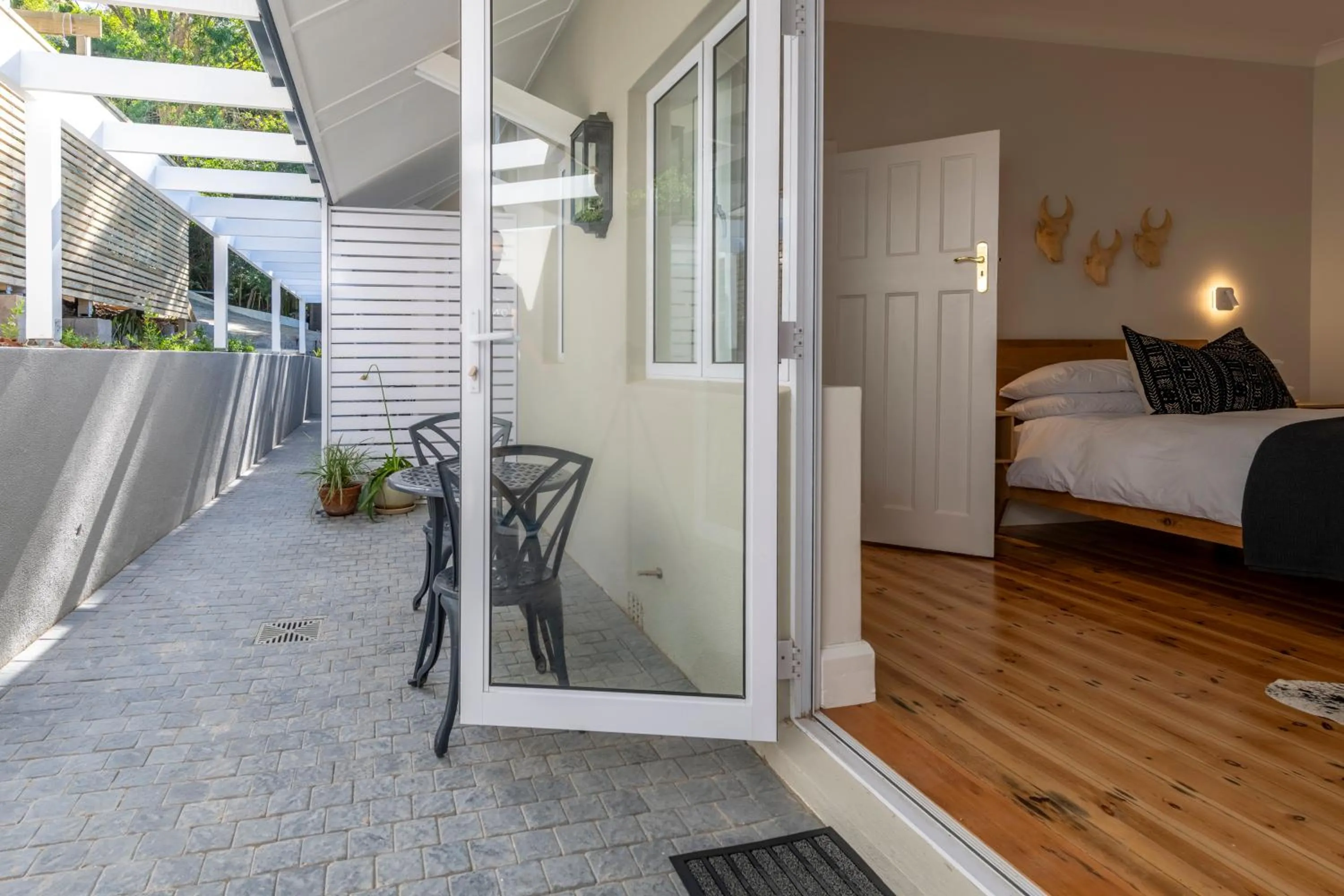 Bed in Hide-Away Guest House