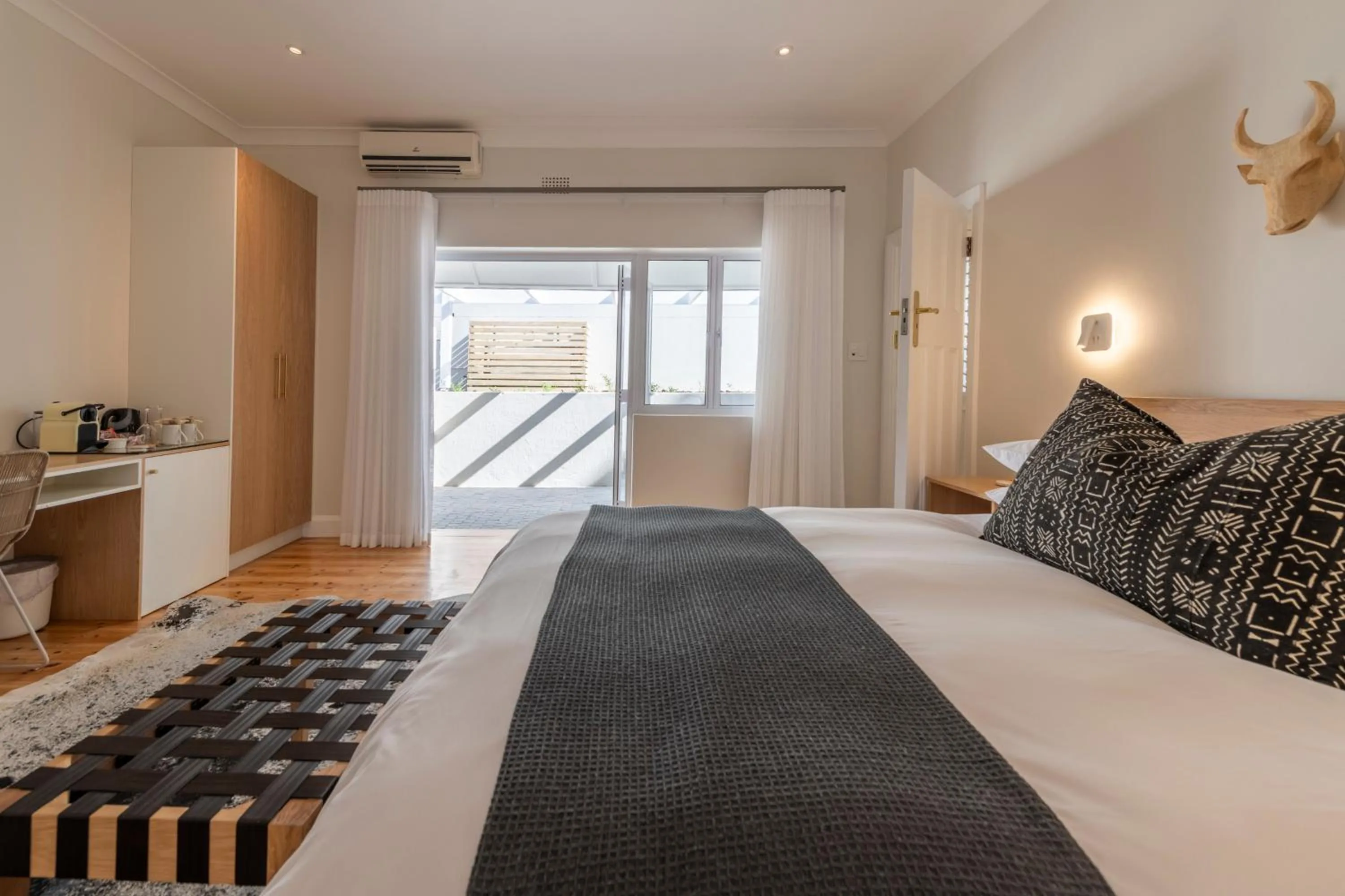 Bed in Hide-Away Guest House