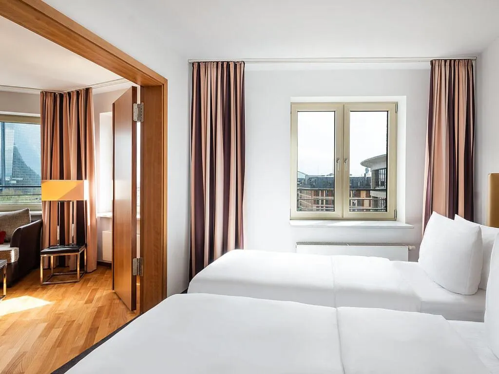 Photo of the whole room, Bed in Main Plaza Suite Tower